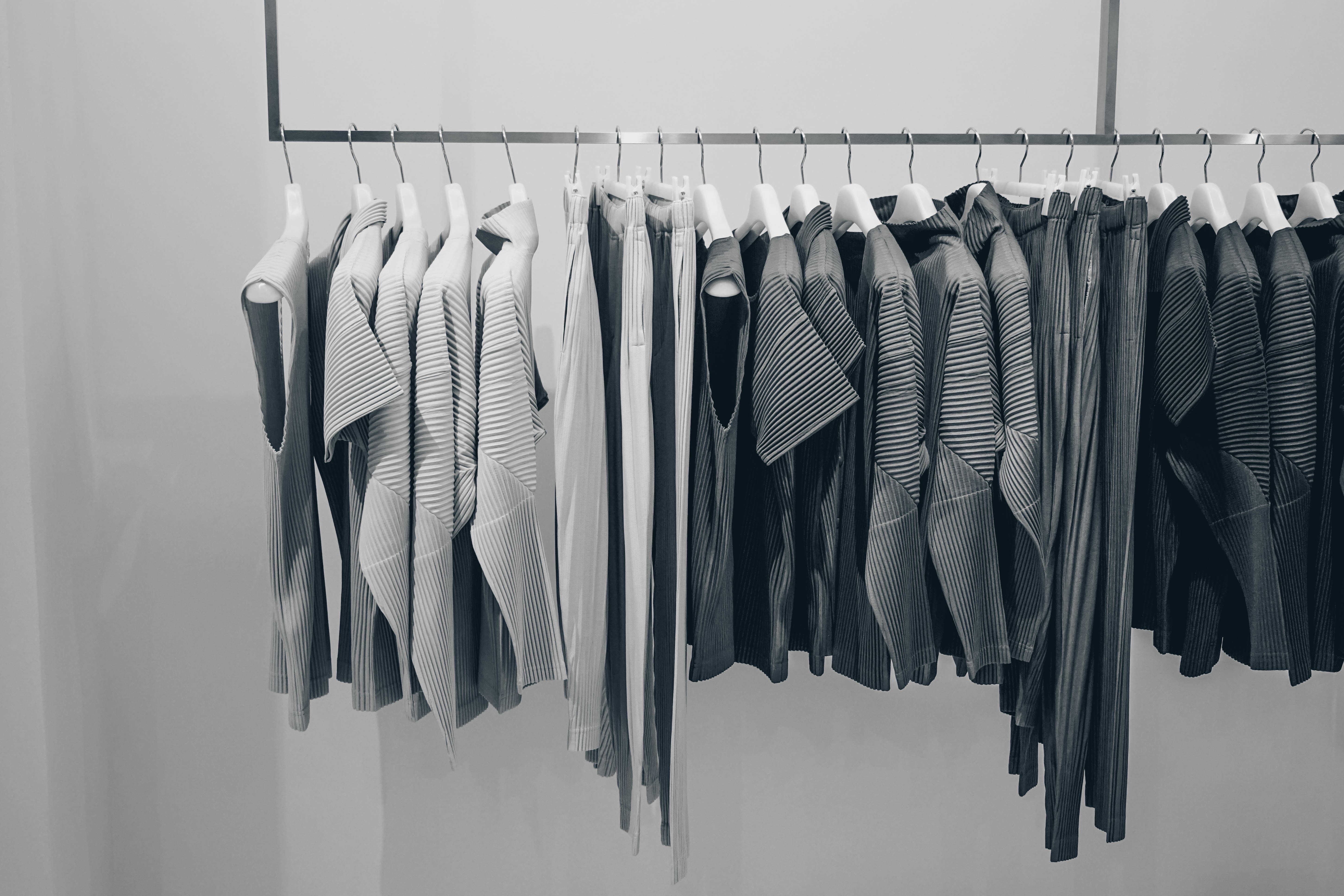 Gray And Black Hanging Clothes Lot Free Image