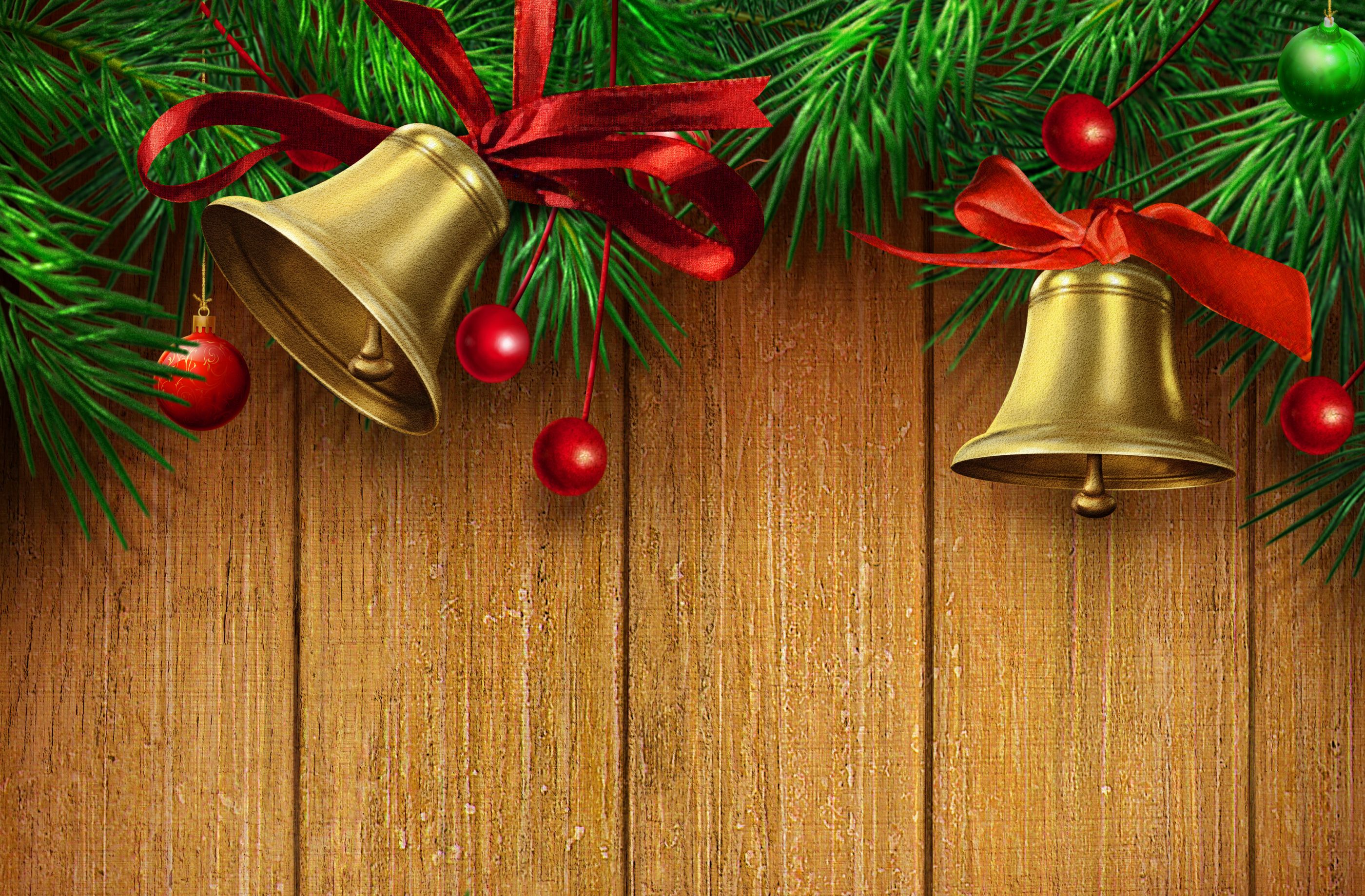 Christmas Wooden Background With Gold Bells And Red Ribbon