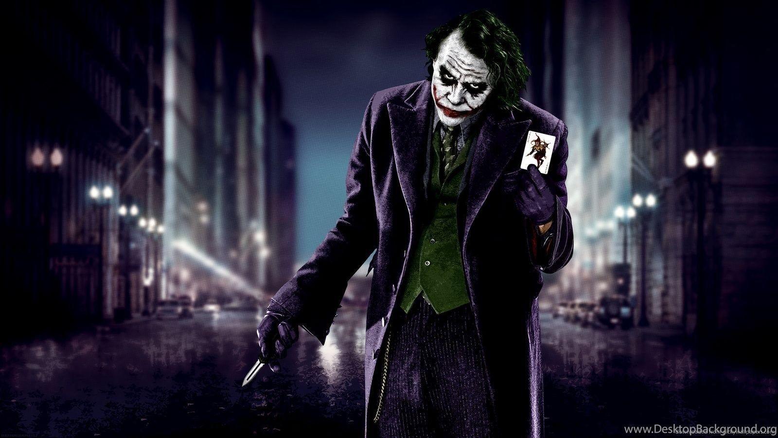 Download 1600x900 Joker Showing His Card Wallpaper Desktop Background