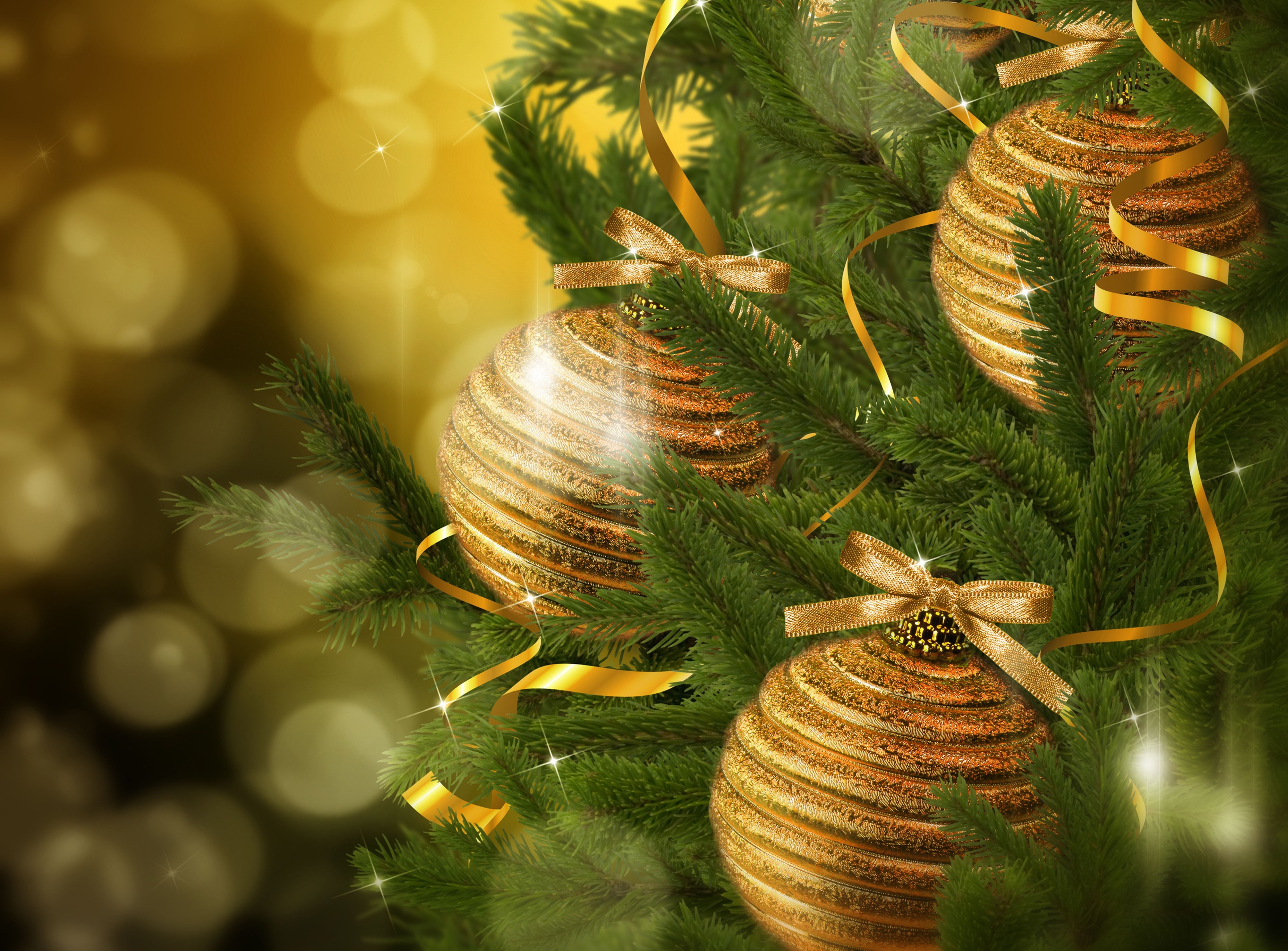 Golden balls and tinsel on the Christmas tree wallpaper and image