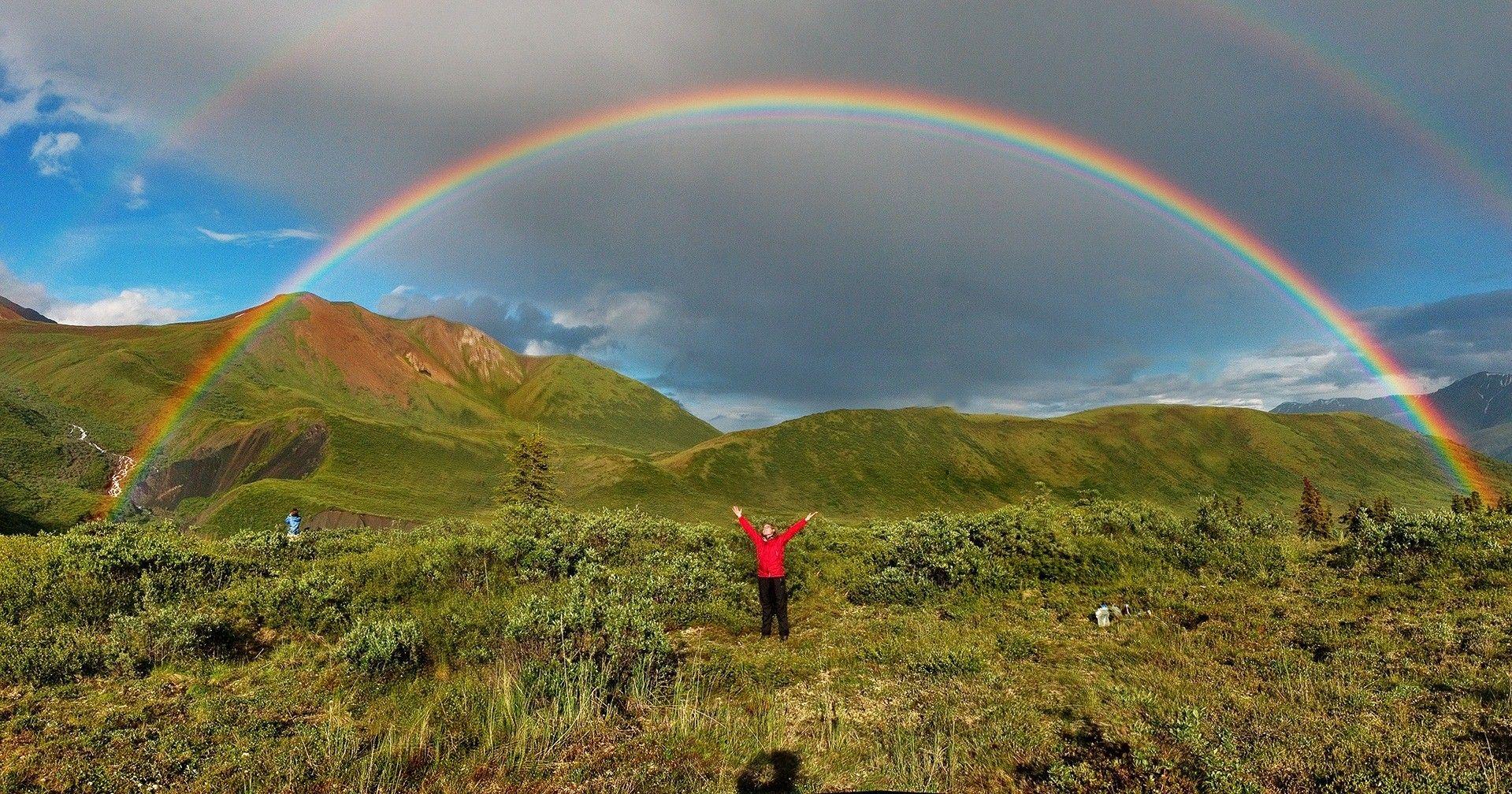 People Enjoy Natural Double Rainbows