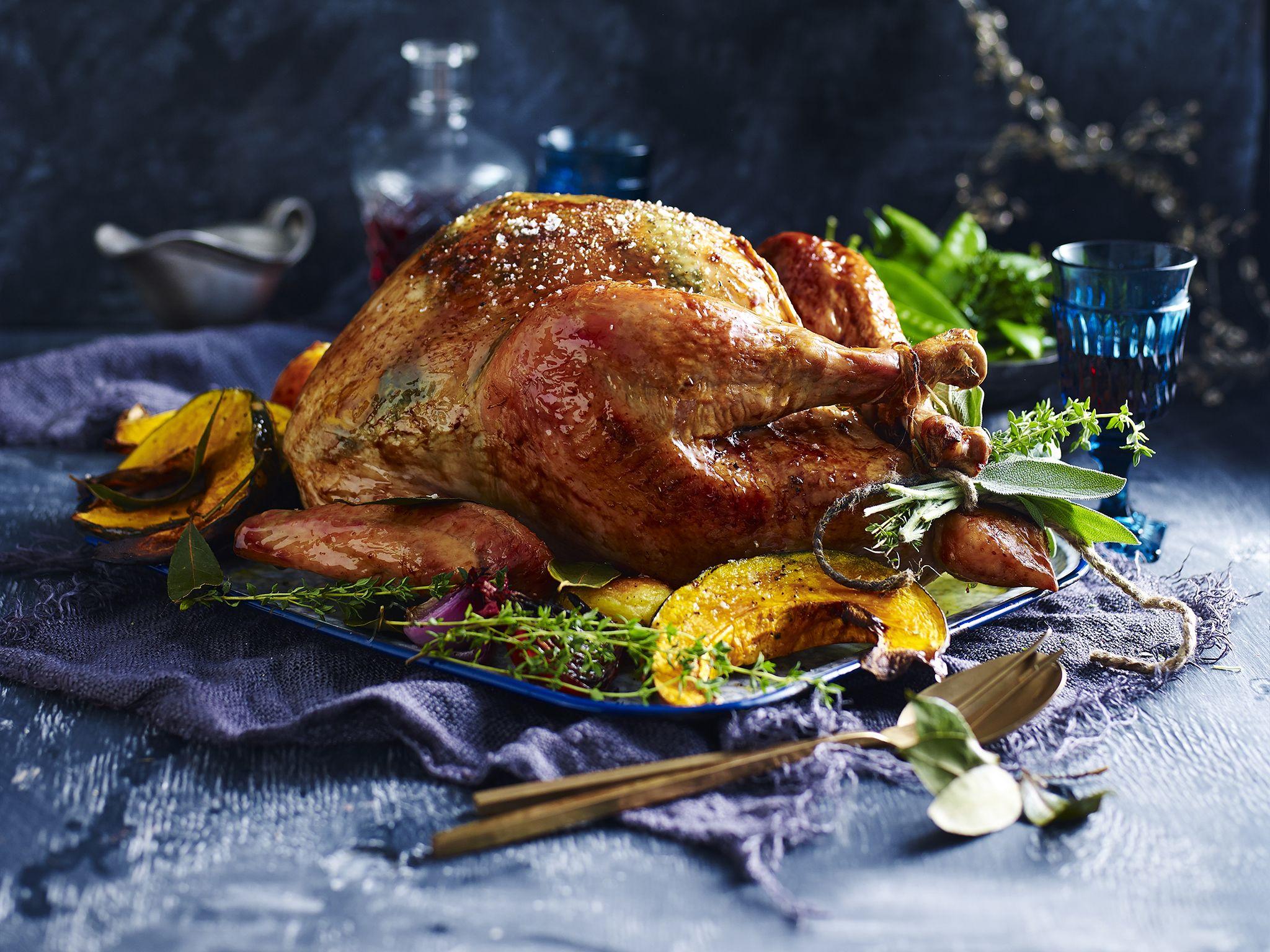 Herbed butter roast turkey with prosciutto and pear stuffing recipe