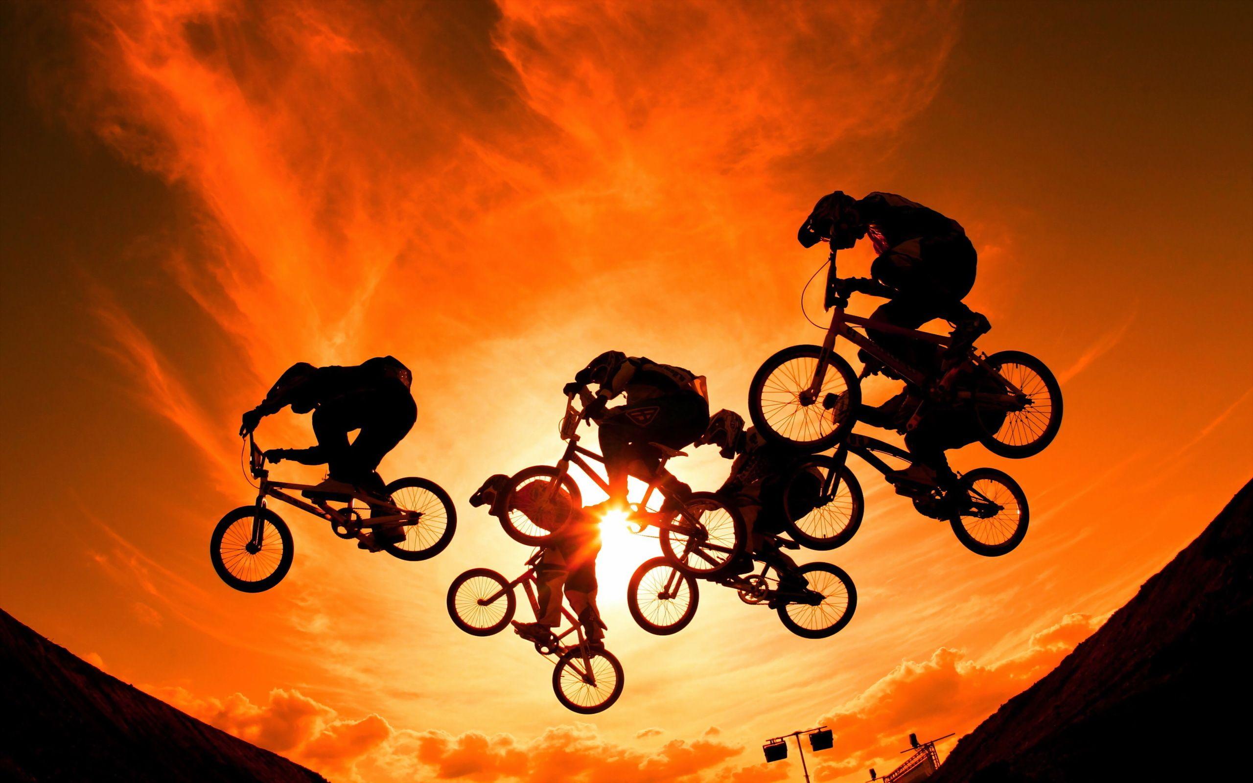 image Cycle race Silhouette Bicycle Sport Jump 2560x1600