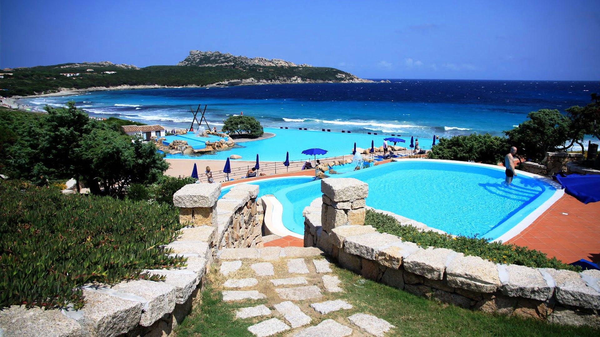 The pool at the hotel on the island of Sardinia, Italy wallpaper