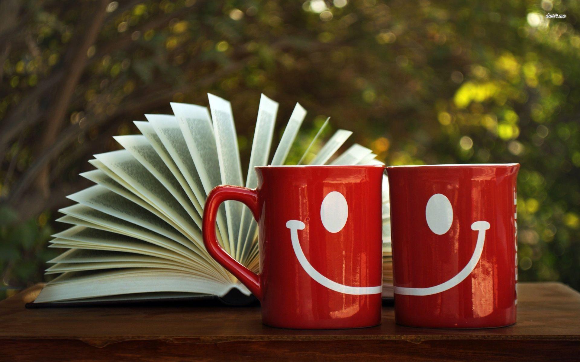 Happy mugs and an open book wallpaper wallpaper