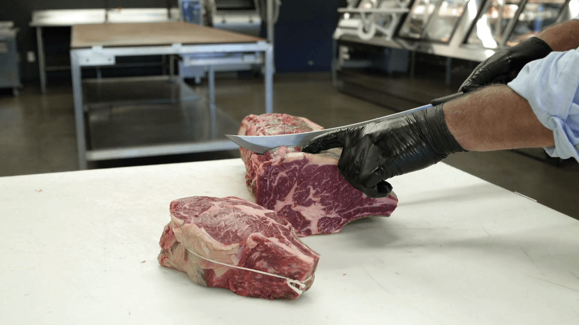 Butcher showing a chunk of meat to camera Stock Video Footage