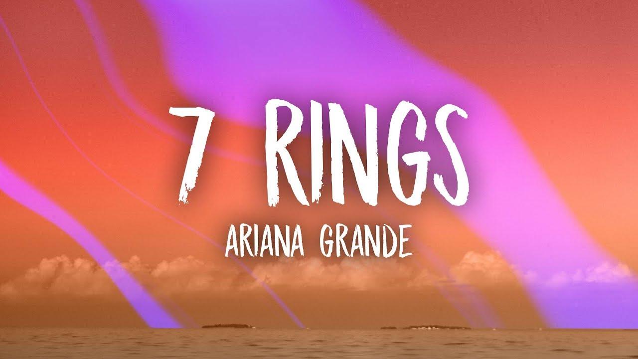 Download Ariana Grande looks fierce and untouchable glowing proudly  wearing seven rings Wallpaper  Wallpaperscom
