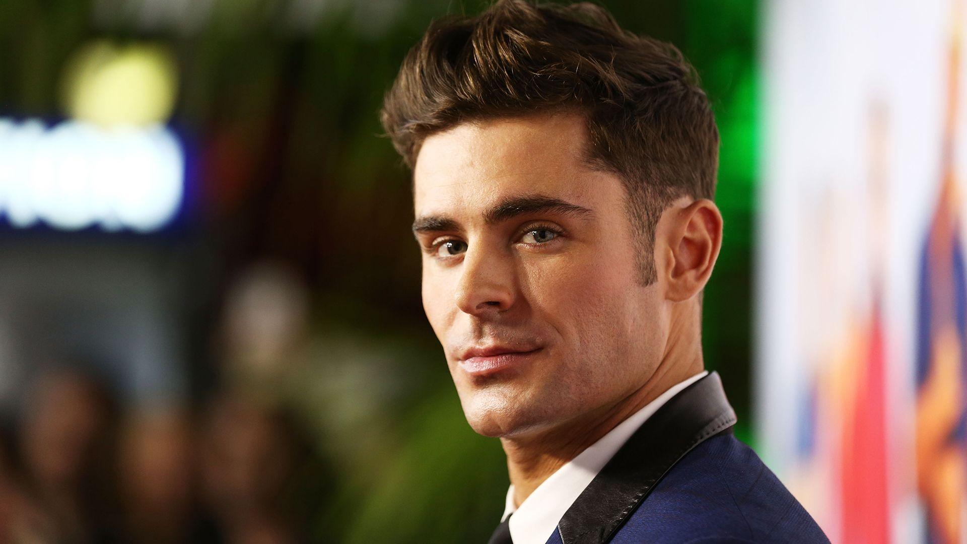 Zac Efron has a mustache at 'The Greatest Showman' premiere