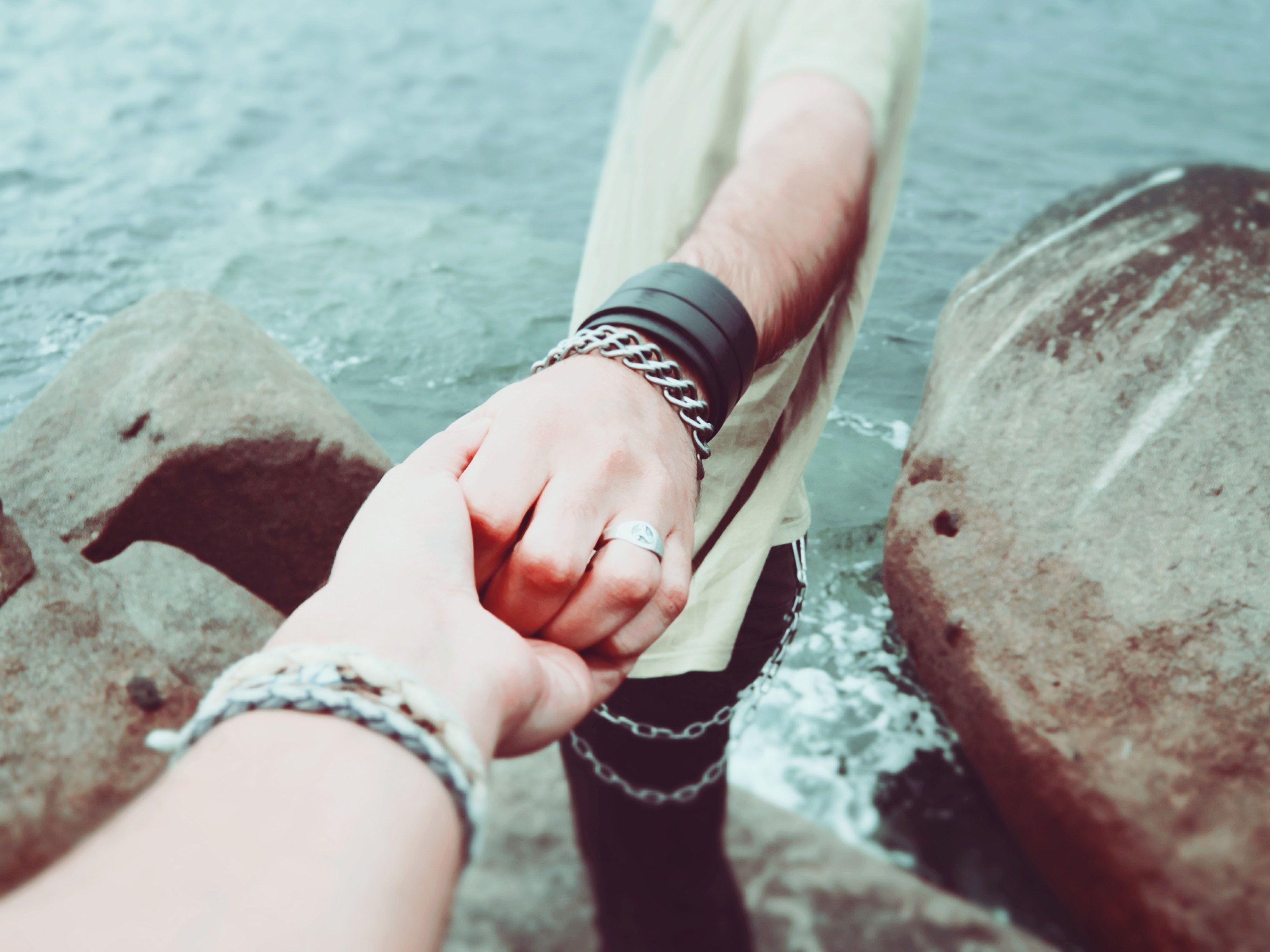 Two Person Holding Hands · Free