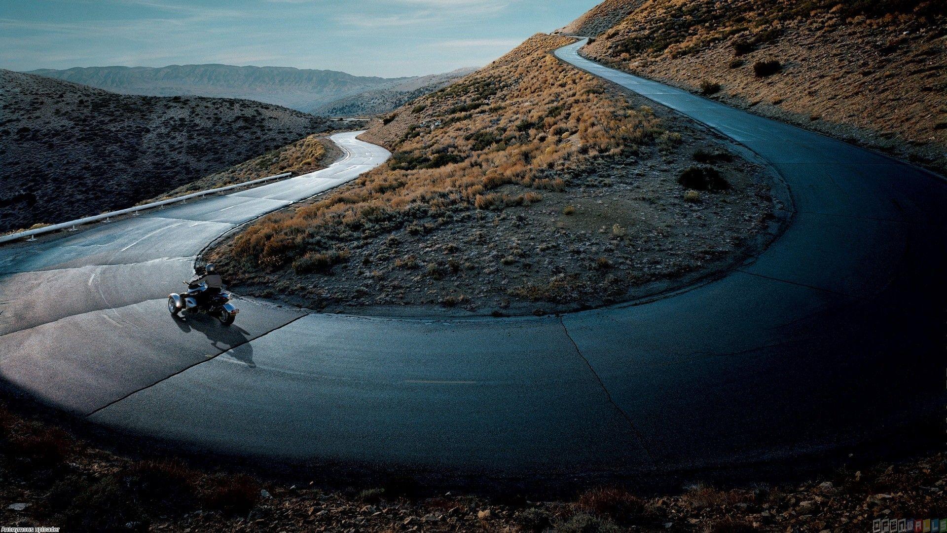 Can am spyder on a mountain road wallpaper