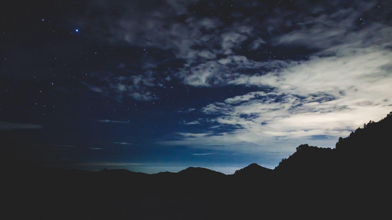 Download wallpaper 1366x768 stars, night, sky, mountains tablet