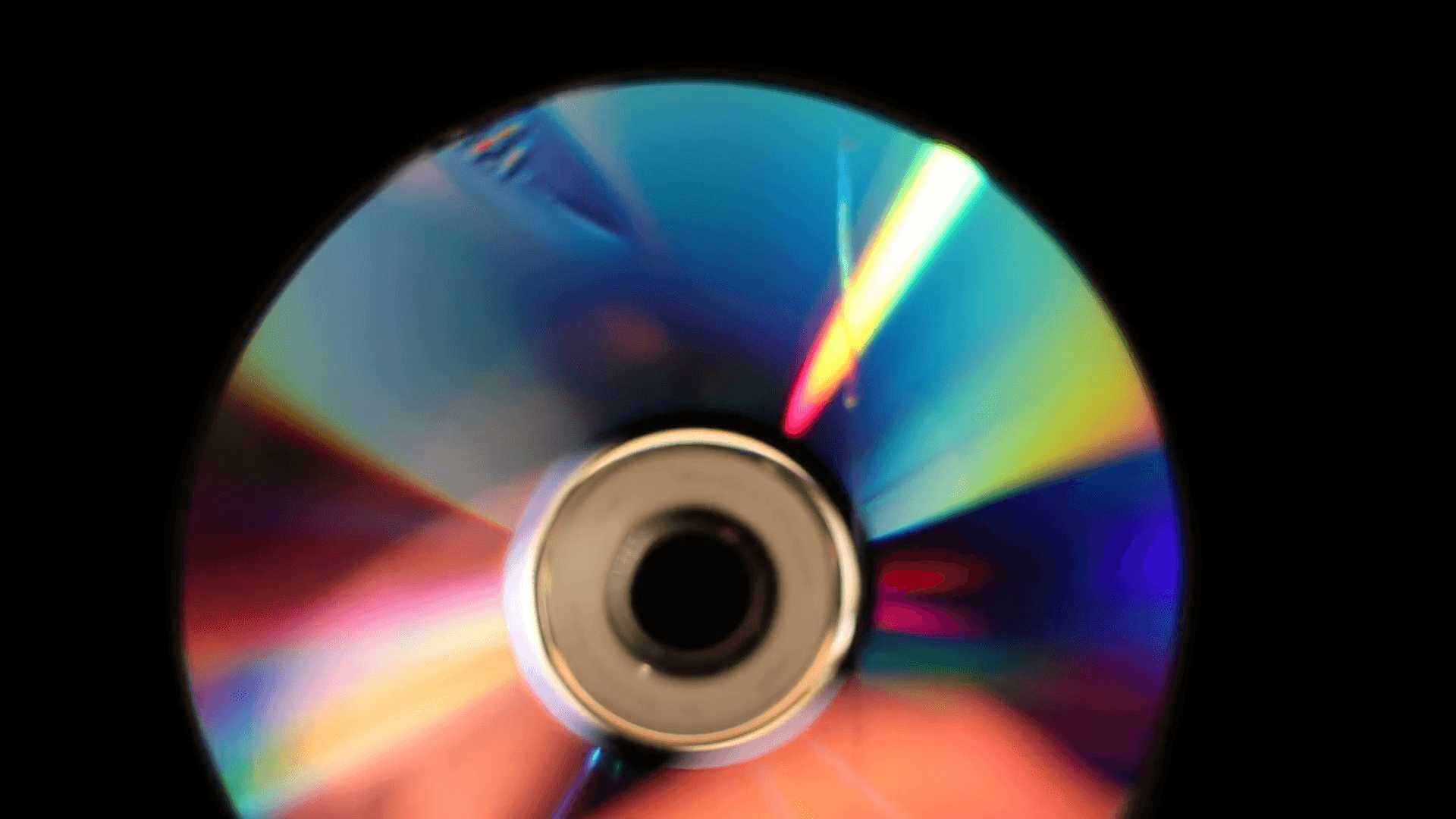 Melting CD / DVD with Heat on Black Background Stock Video Footage