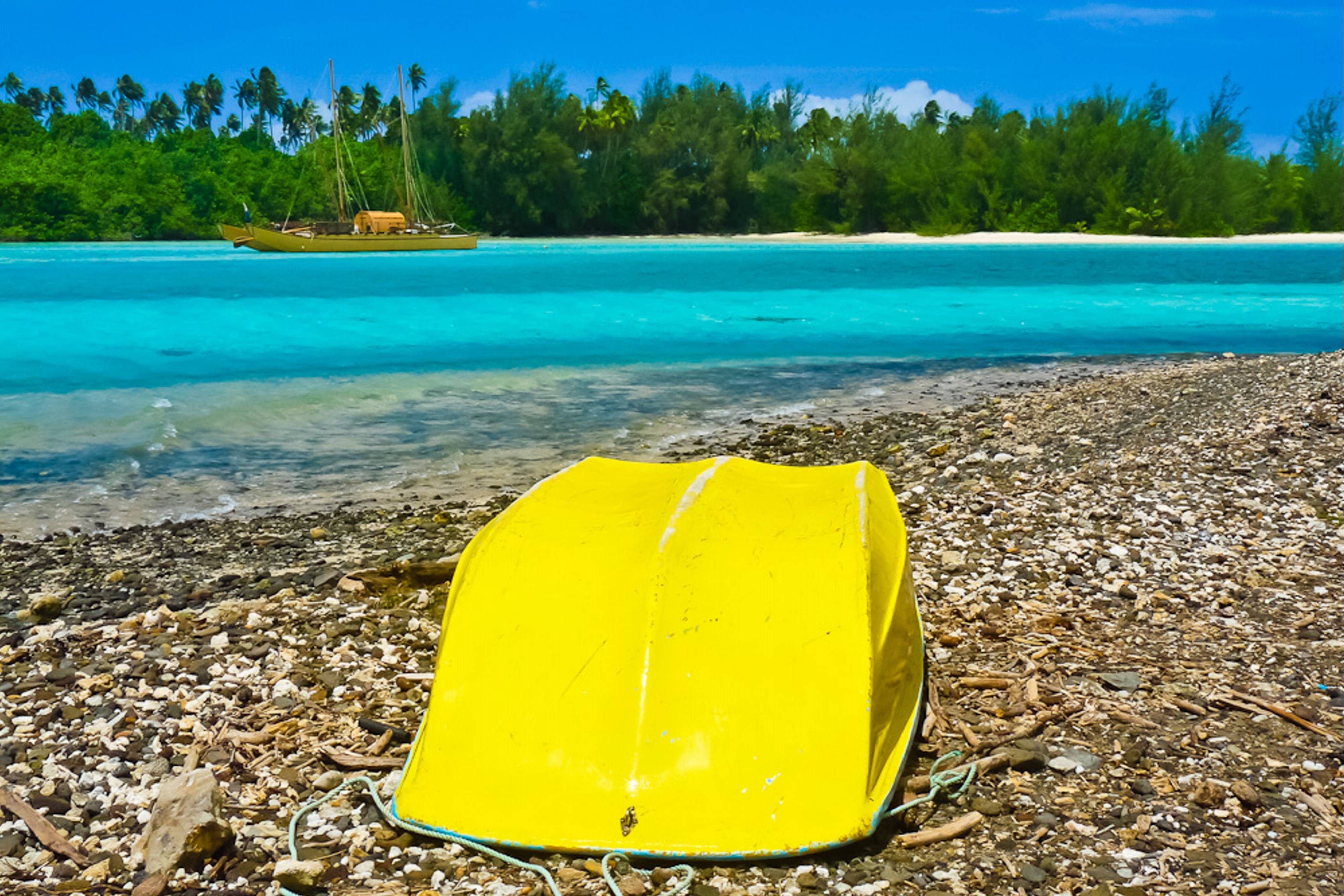 Yellow boat in rarotonga south pacific wallpaper