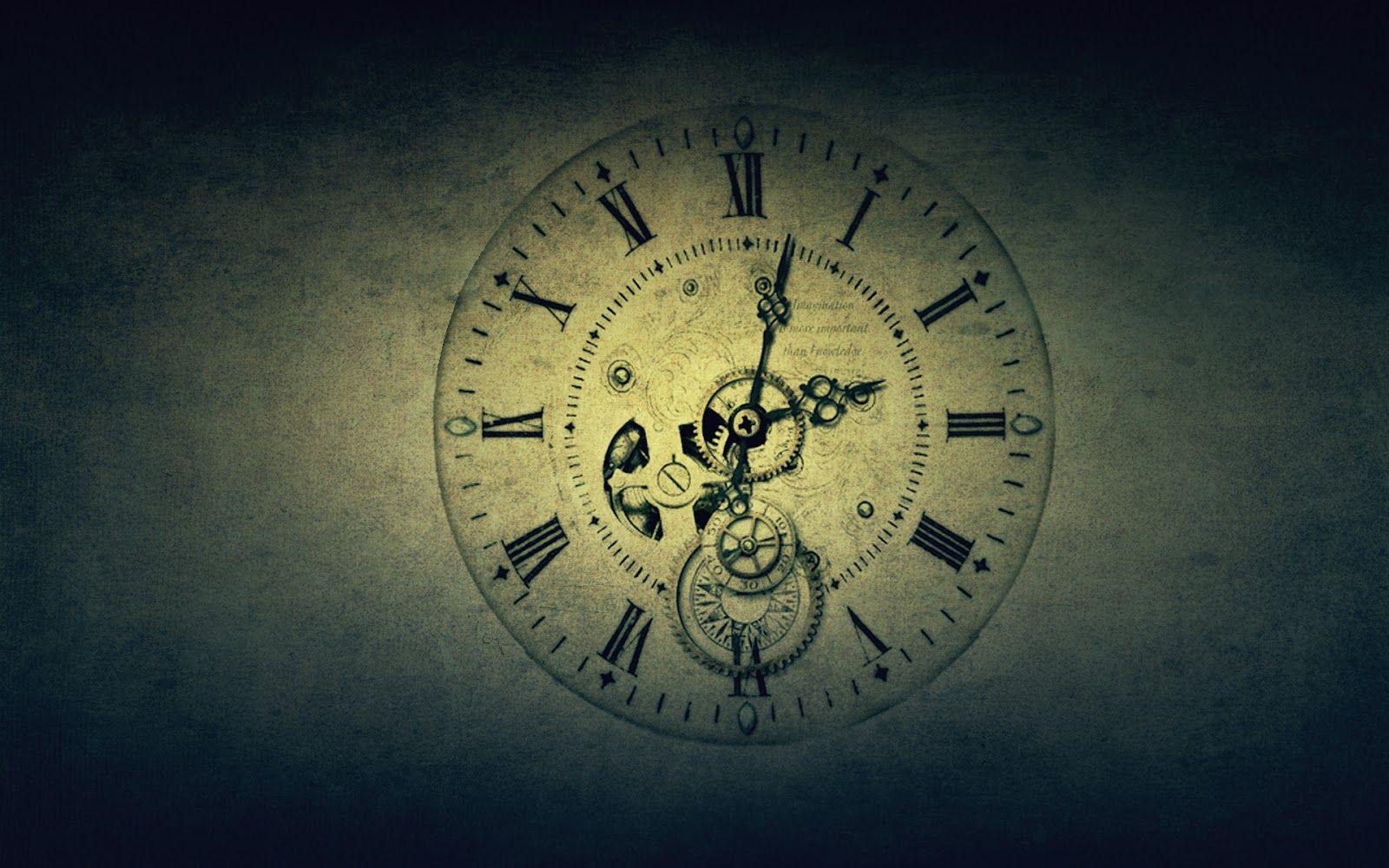 Big watch in a big darkish background Dream Wallpaper