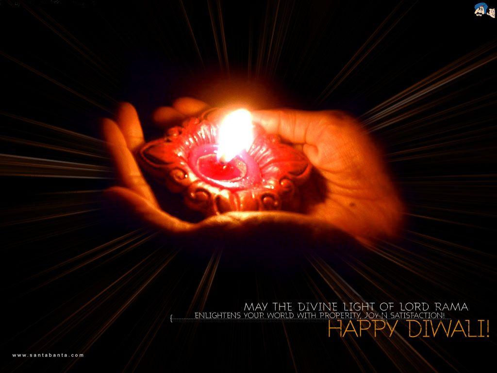 happy diwali 2011: Diya in Hand Wallpaper, Deepavali Diya Hand Picture