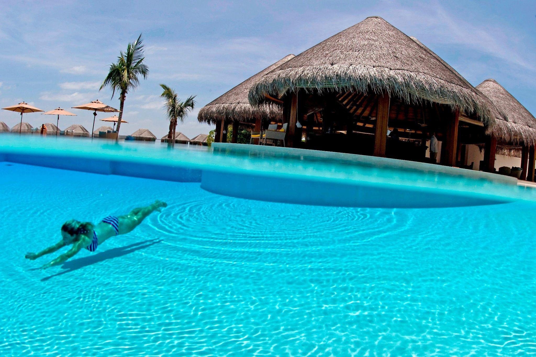 Clear blue azure swimming pool south polynesia wallpaper