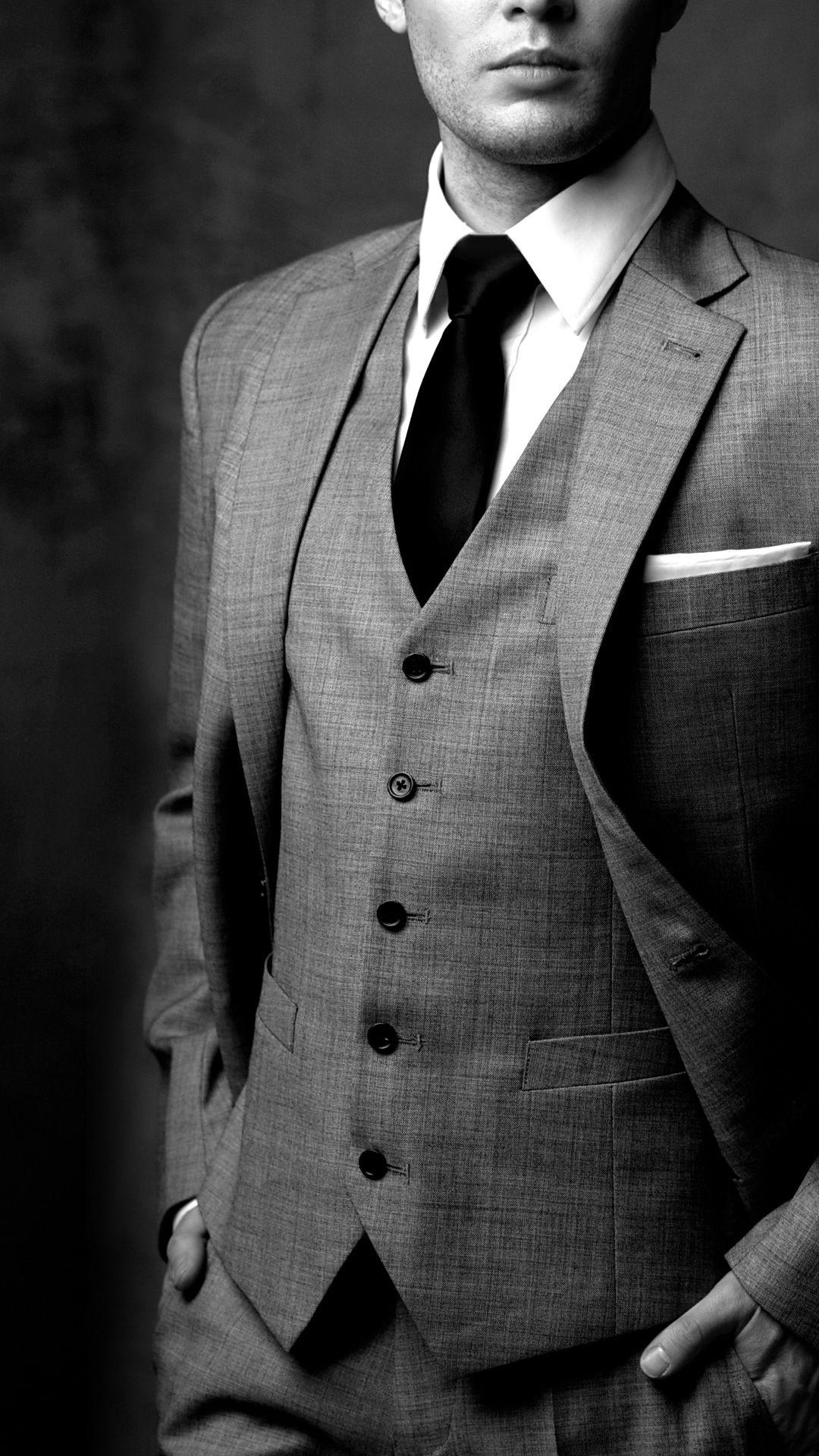 Premium Photo | Businessman in black suit on black