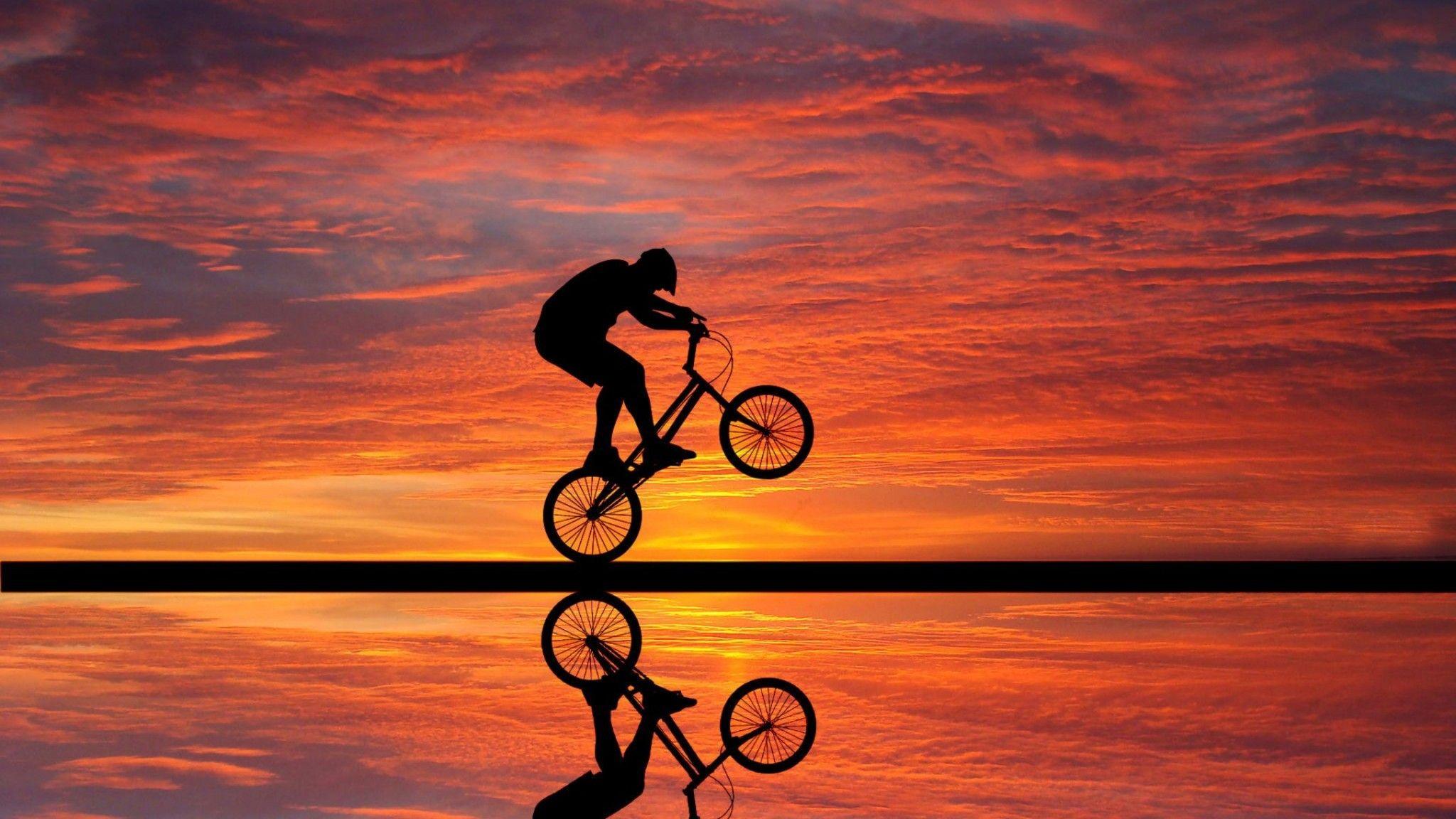 Cycling Sunset 2048x1152 Resolution HD 4k Wallpaper