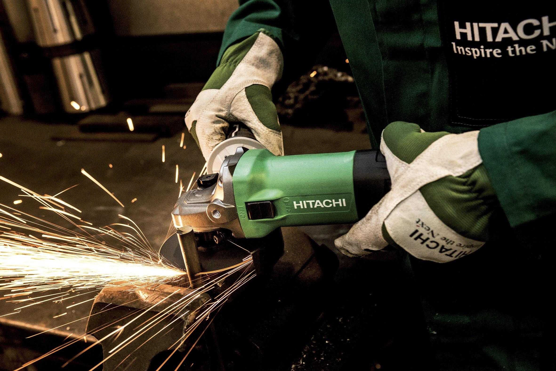 Person Operating Hitachi Angle Grinder · Free