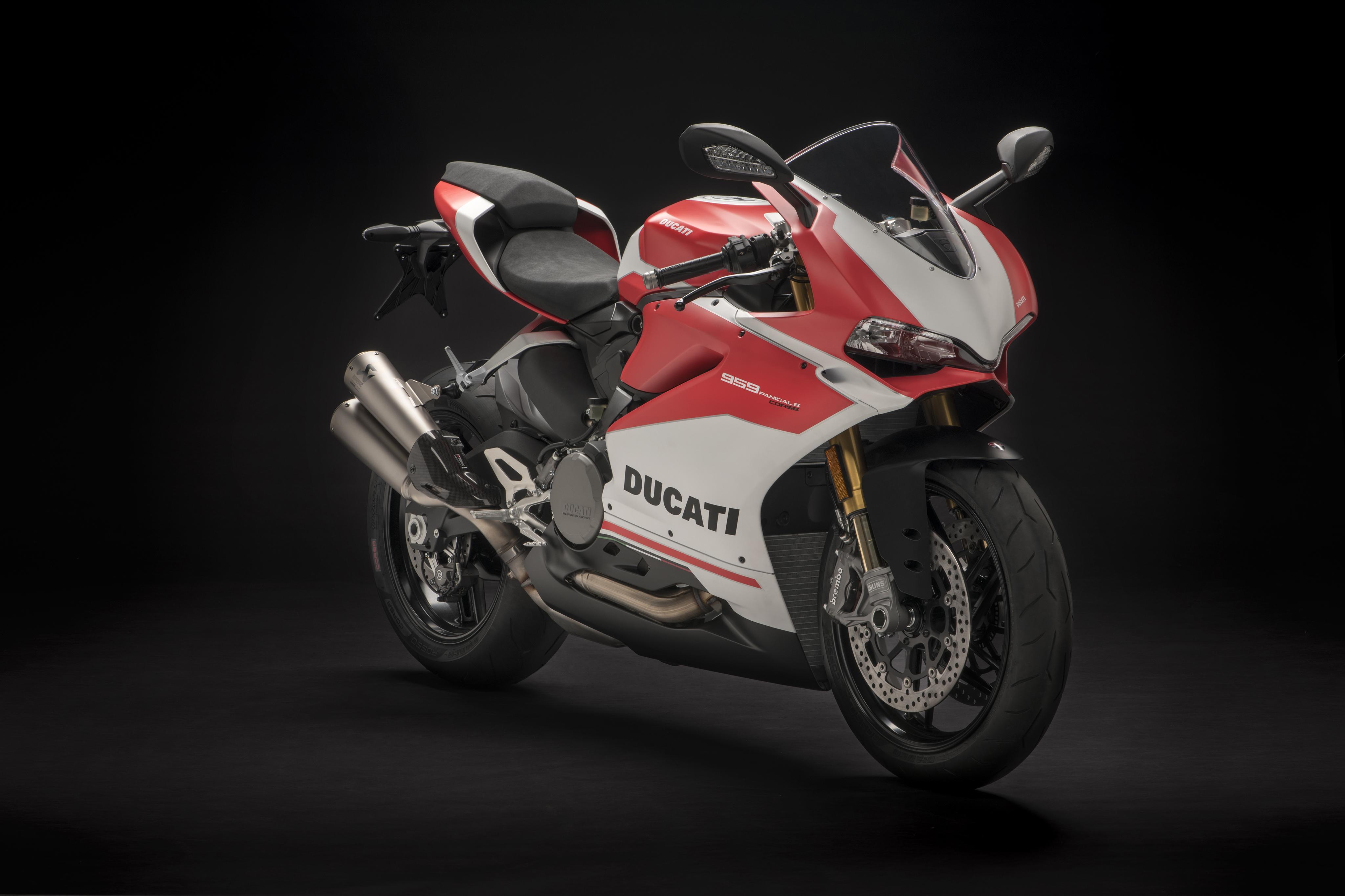 Red motorcycle Ducati 959 Panigale Corse, 2018 on a black background