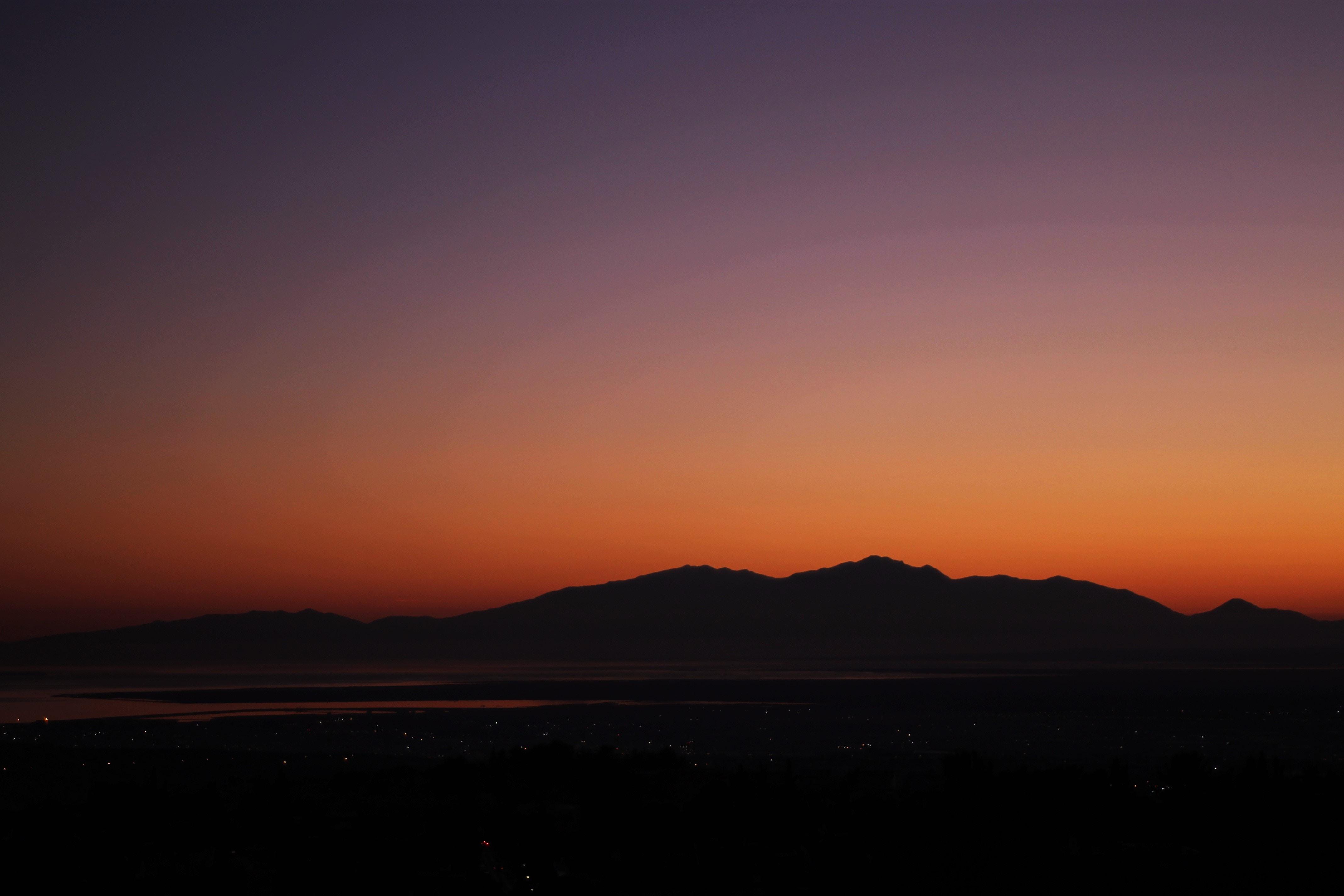 Download wallpaper 4272x2848 mountains, horizon, sunset, sky HD