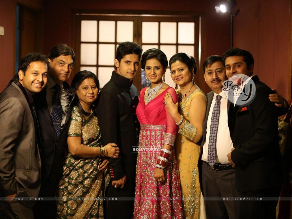 Wallpaper Dubey and Sargun Mehta with their family at the Reception Party size:1024x768