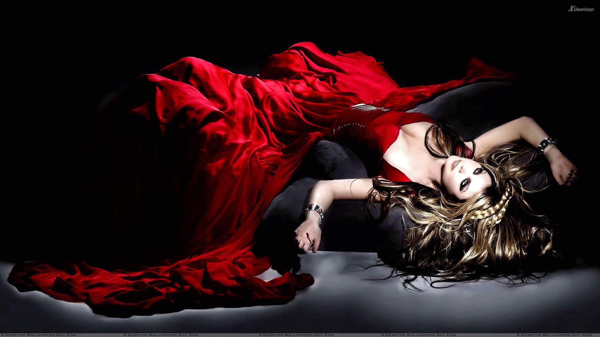 Beautiful Pose Of Sarah Brightman Laying In Long Red Dress Wallpaper
