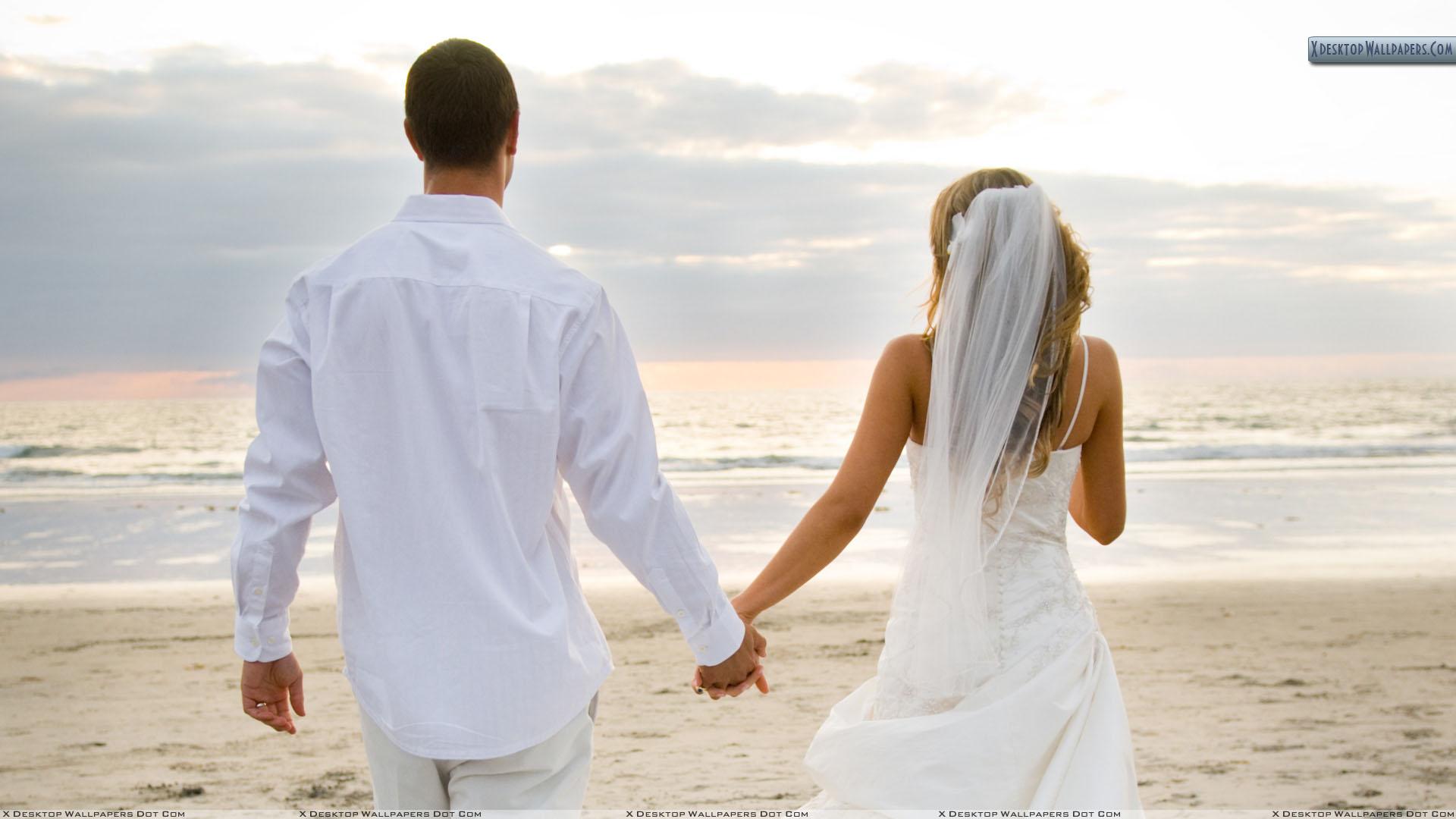 Couple Near Beach After Marriage Wallpaper