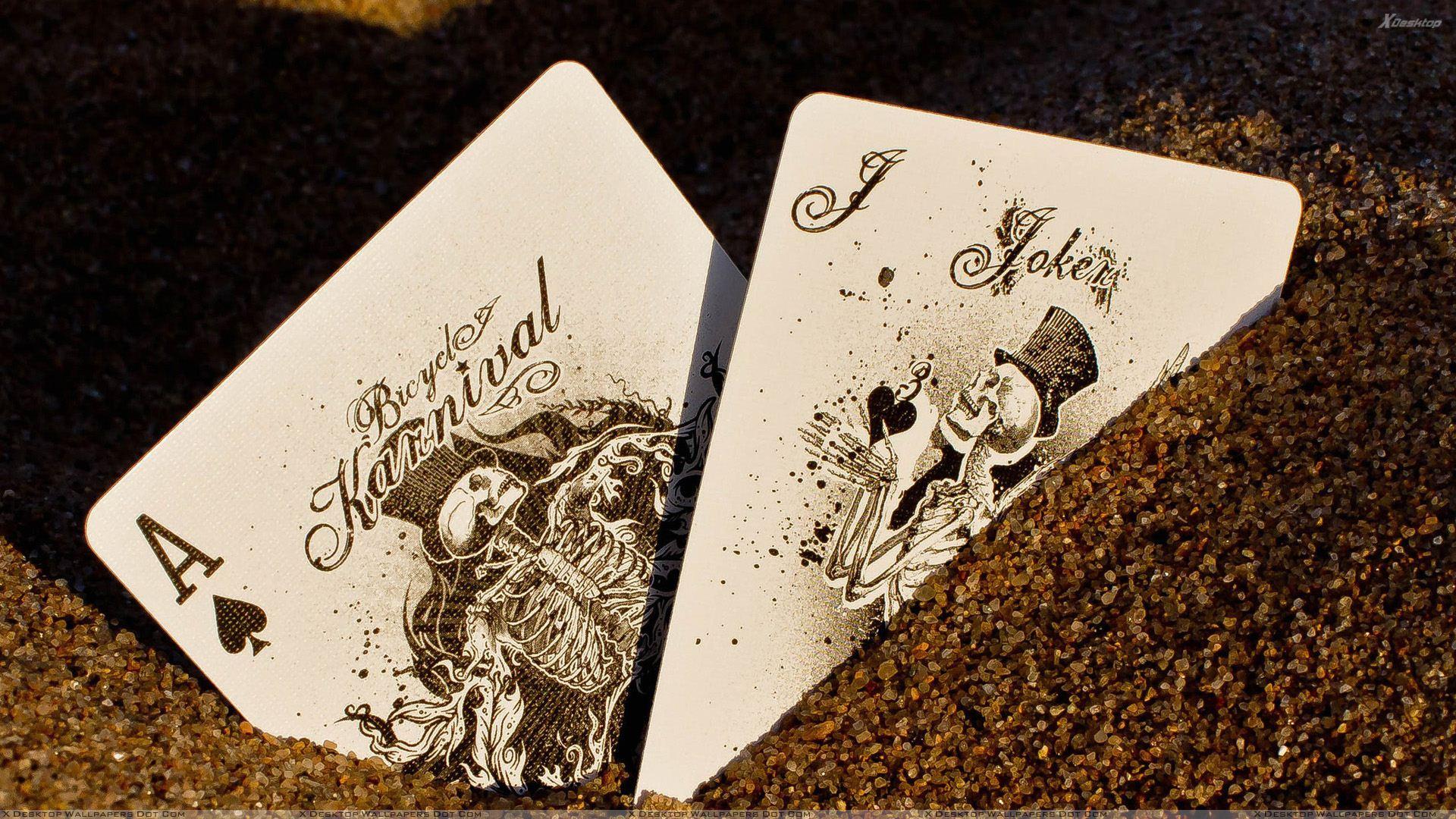 Playing Cards Buried In The Sand Wallpaper