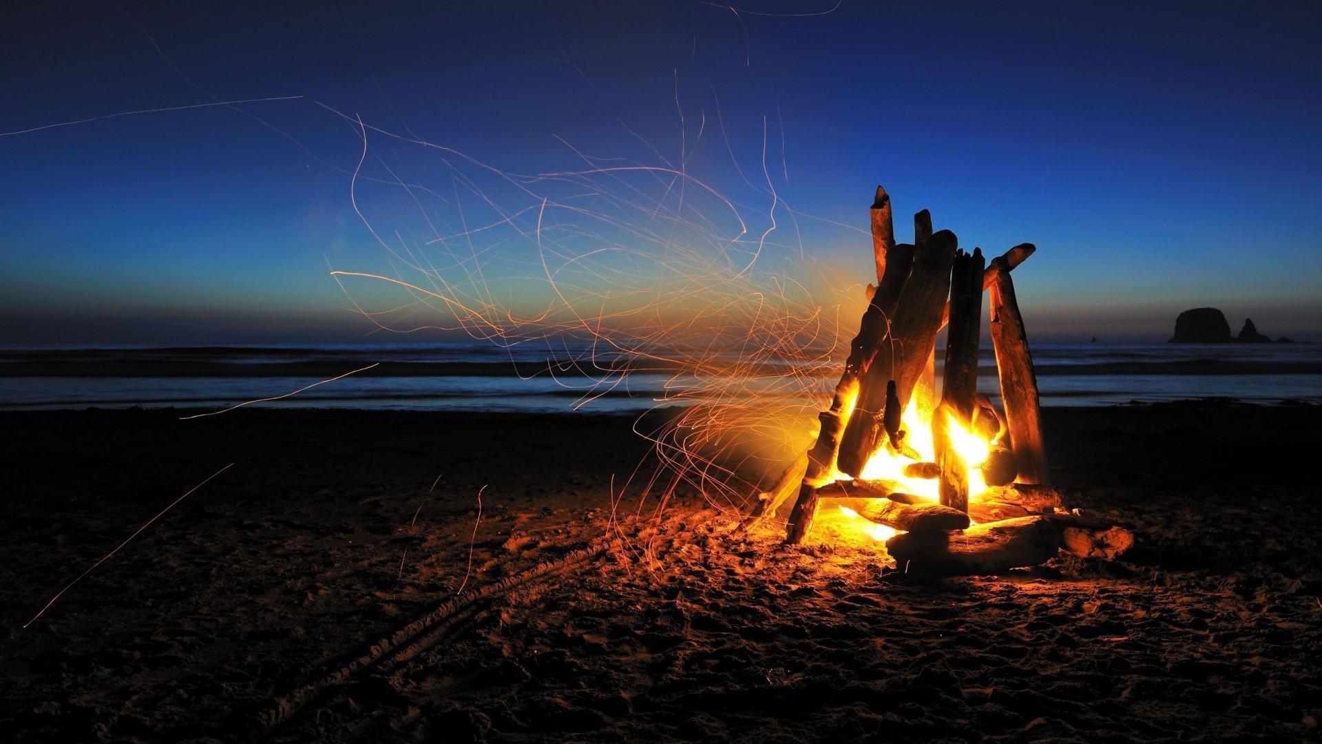 Download 1920x1080 Camp Fire, Beach, Sparks, Night, Stars, Ocean
