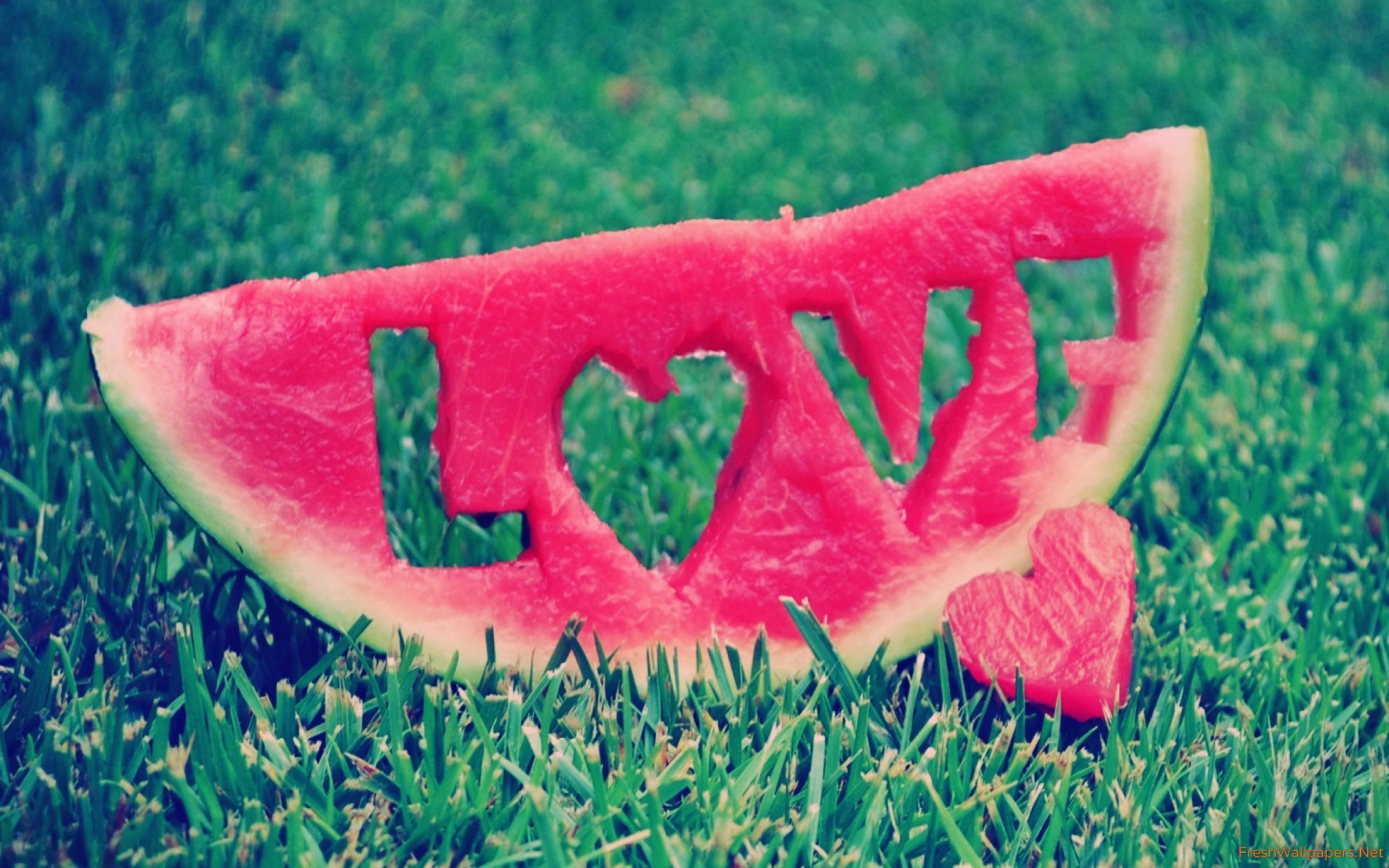 Love carved in a watermelon wallpaper