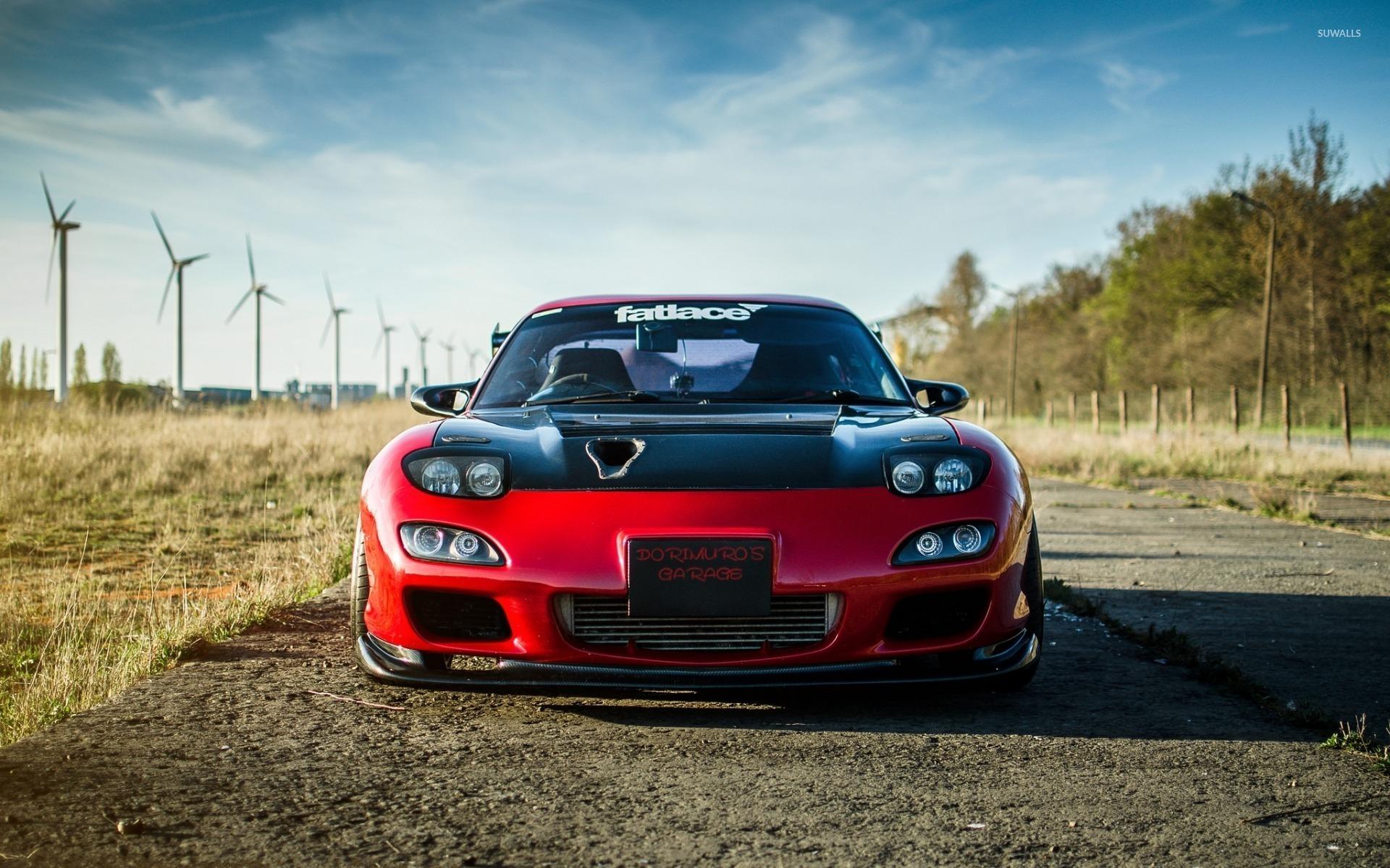 Front View Of A Dorimuro's Garage Mazda RX 7 Wallpaper