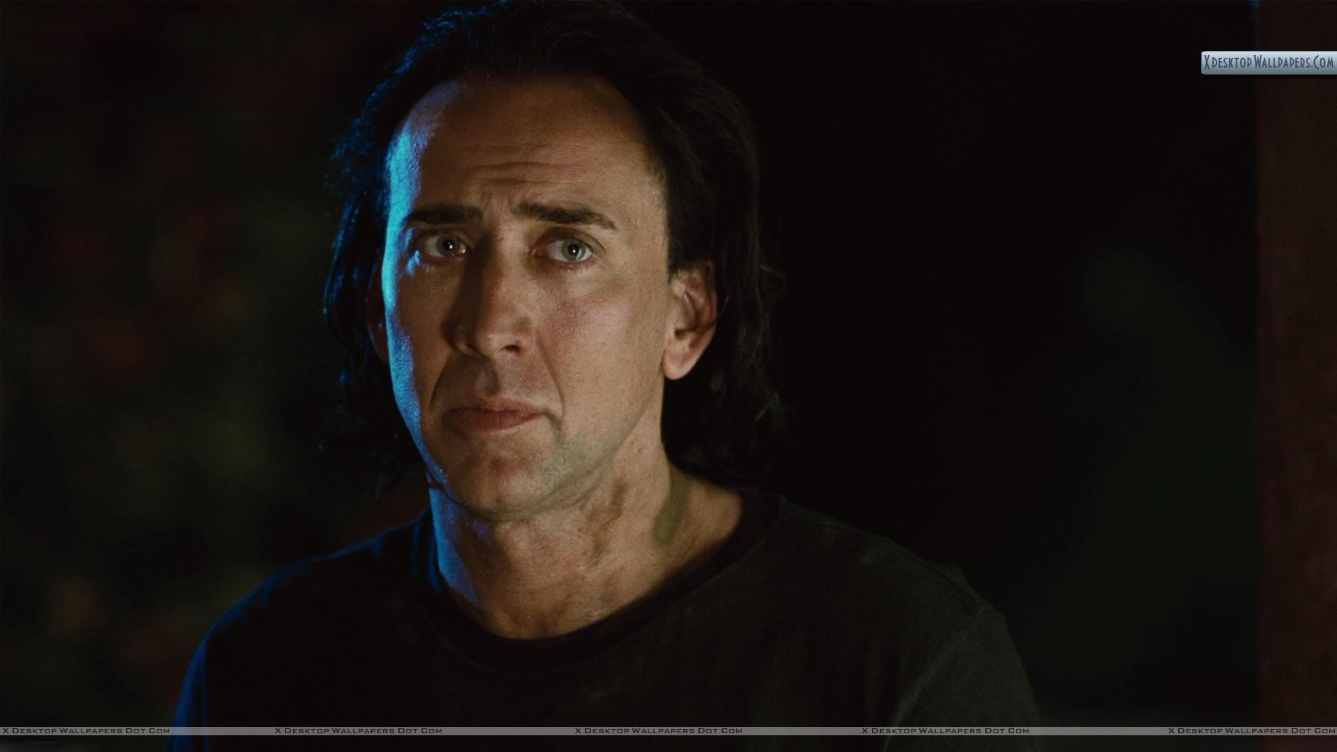 Nicolas Cage In Night Outside House Wallpaper