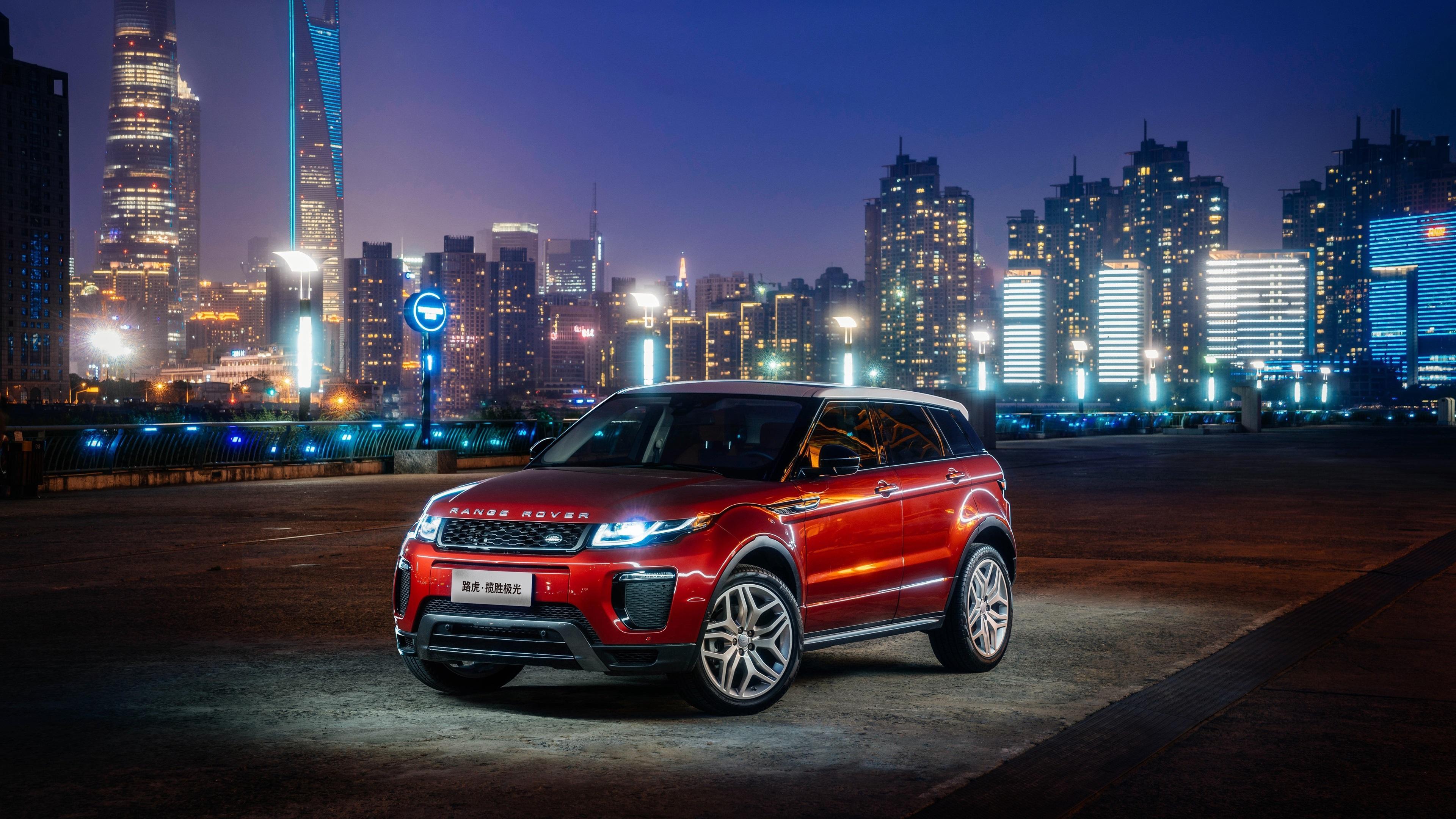 Wallpaper Land Rover Range Rover Evoque red SUV at city night