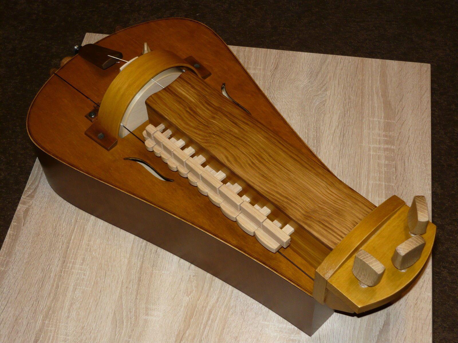 Hurdy gurdy. Woodworking. Hurdy gurdy, Violin, Musical Instruments
