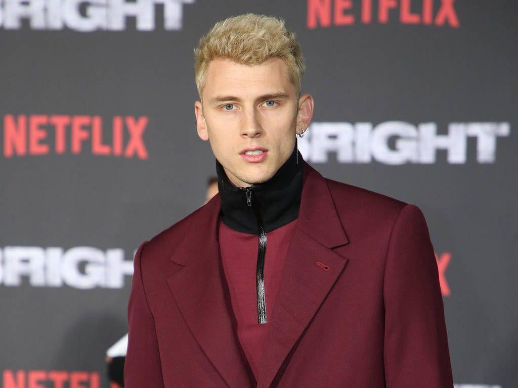 Rapper Machine Gun Kelly hits out at Eminem on new diss track