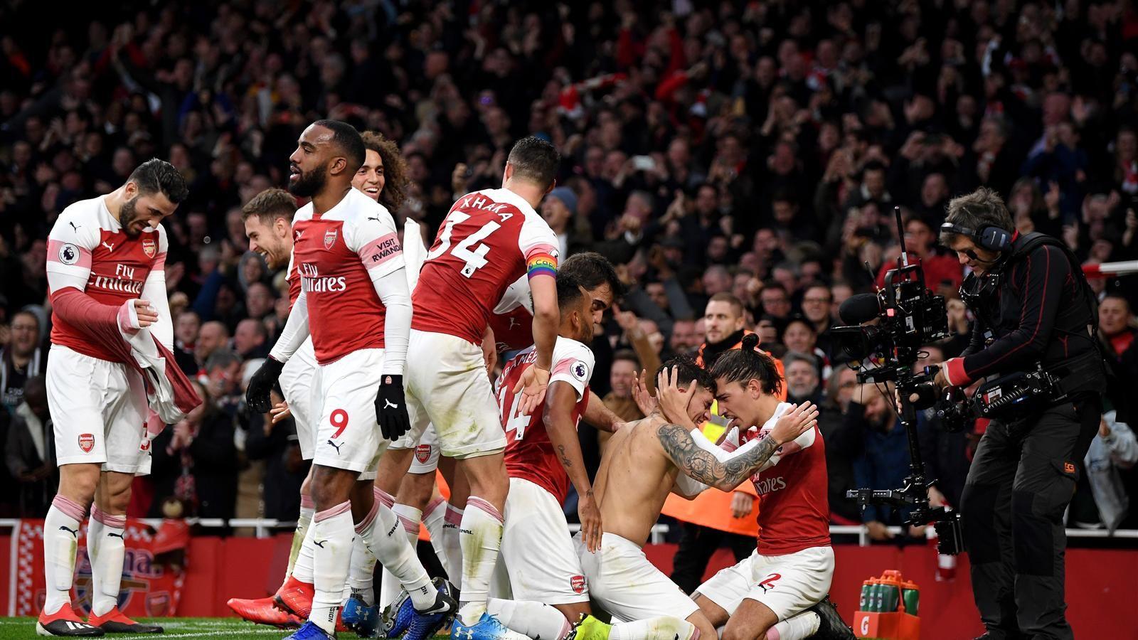 A wind of madness and Arsenal overthrow Tottenham to afford