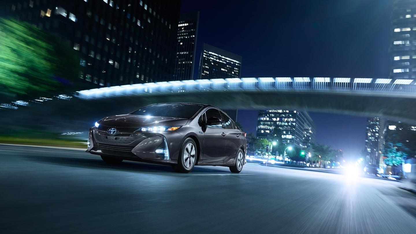 Toyota Prius Prime 2017 on road in night desktop background
