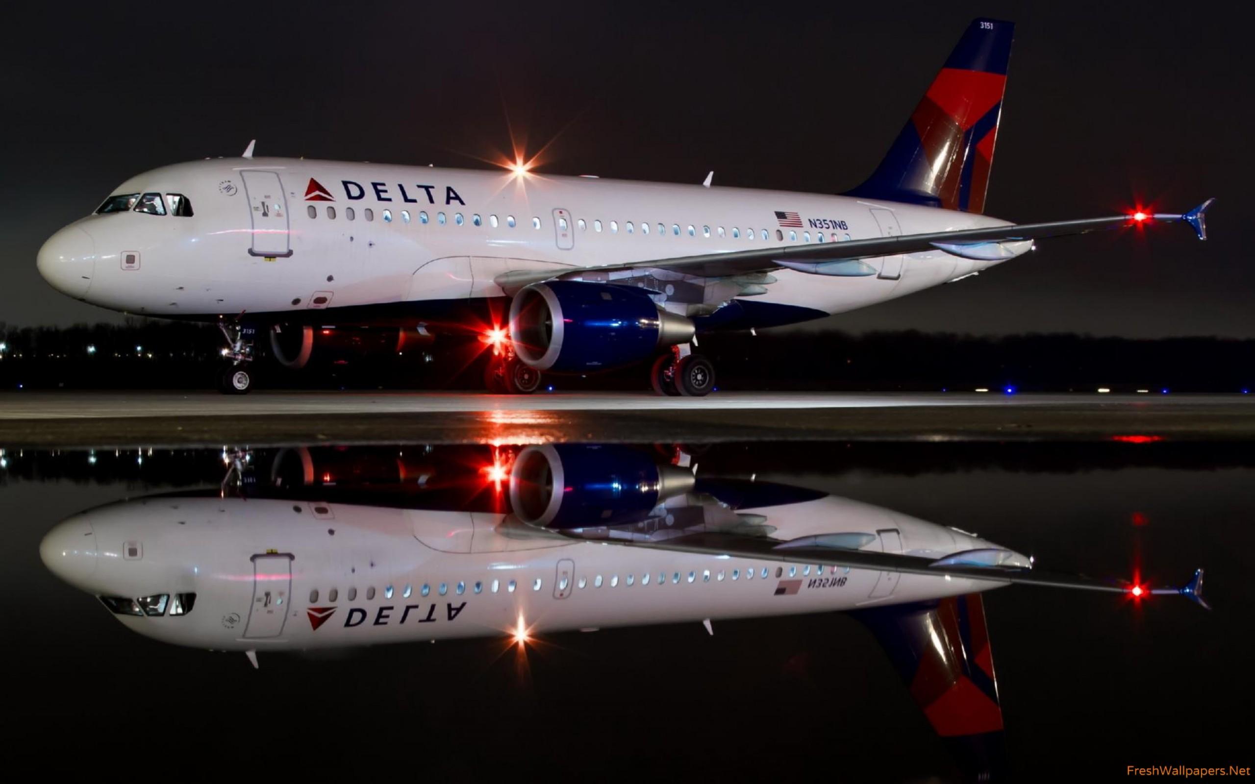 Delta Airbus A319 at night wallpaper