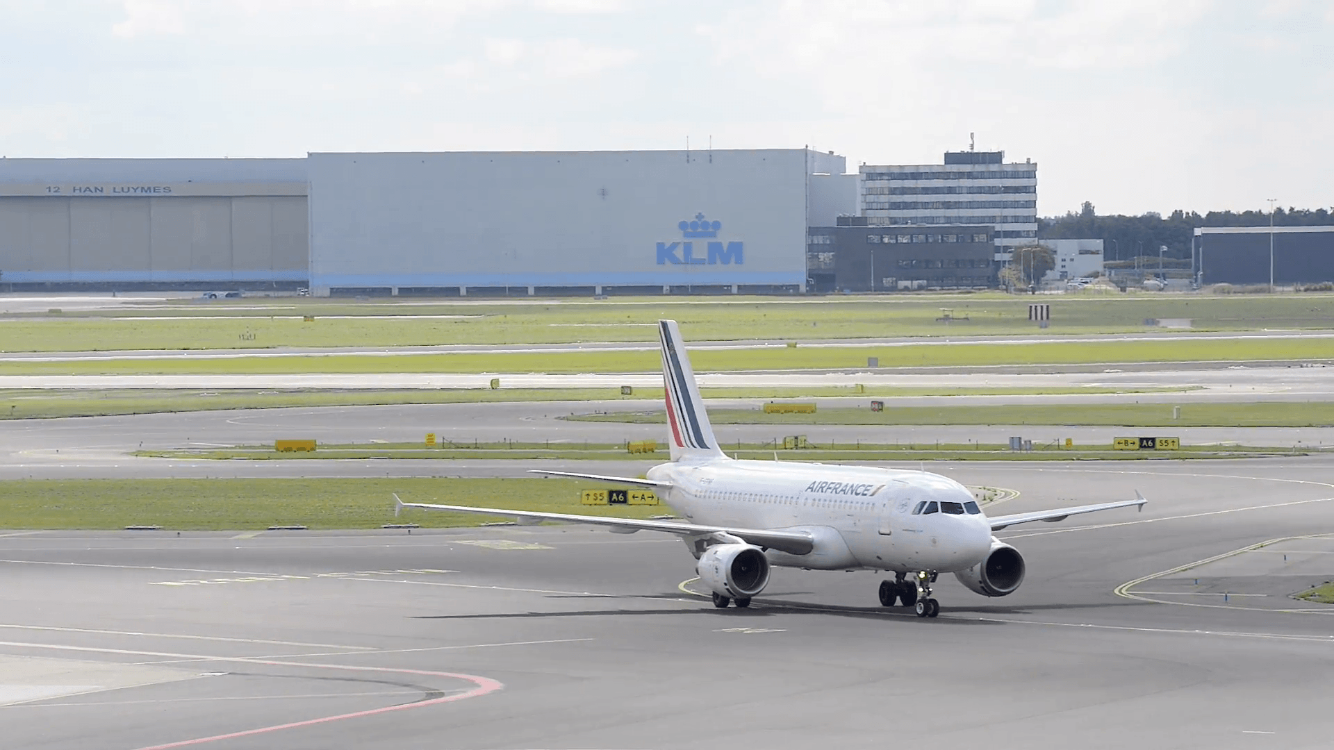 Air France Airbus A319 airplane taxiing to the gate at Schiphol