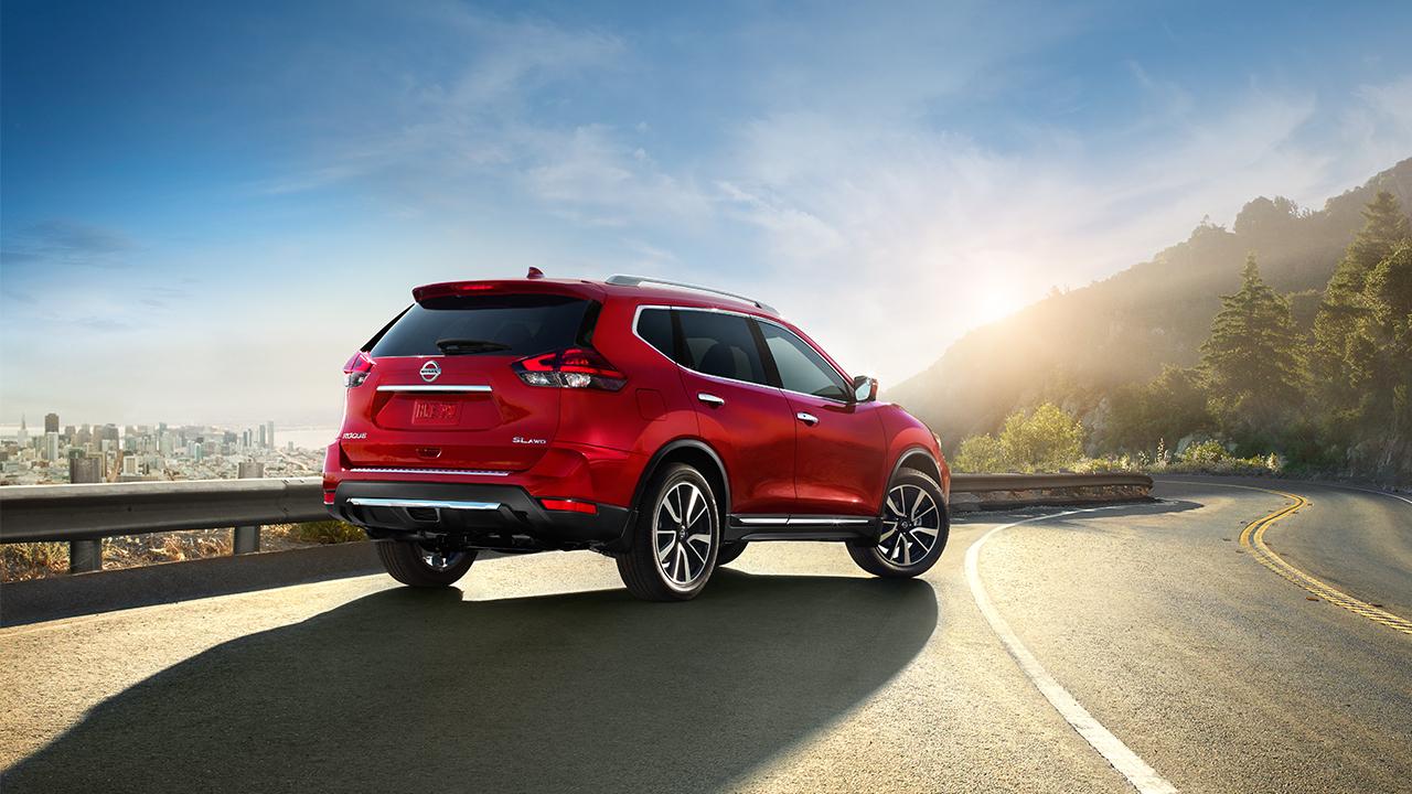 Nissan Rogue red color rear back side view 4k uhd wide