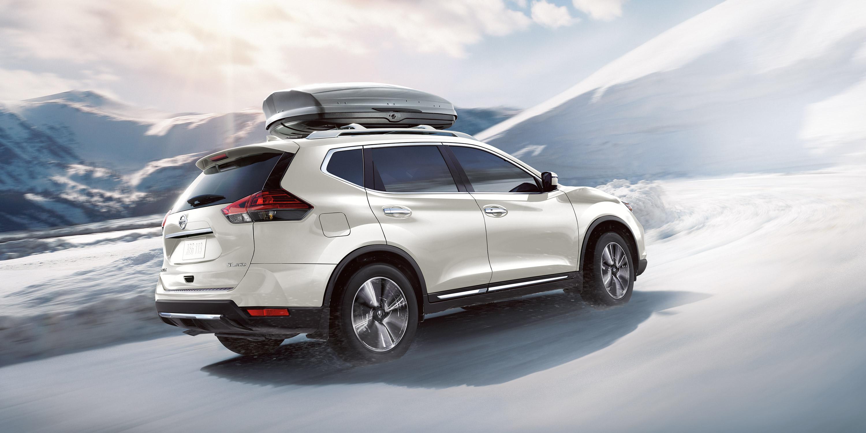 Nissan Rogue white color on snow road full speed 4k side view