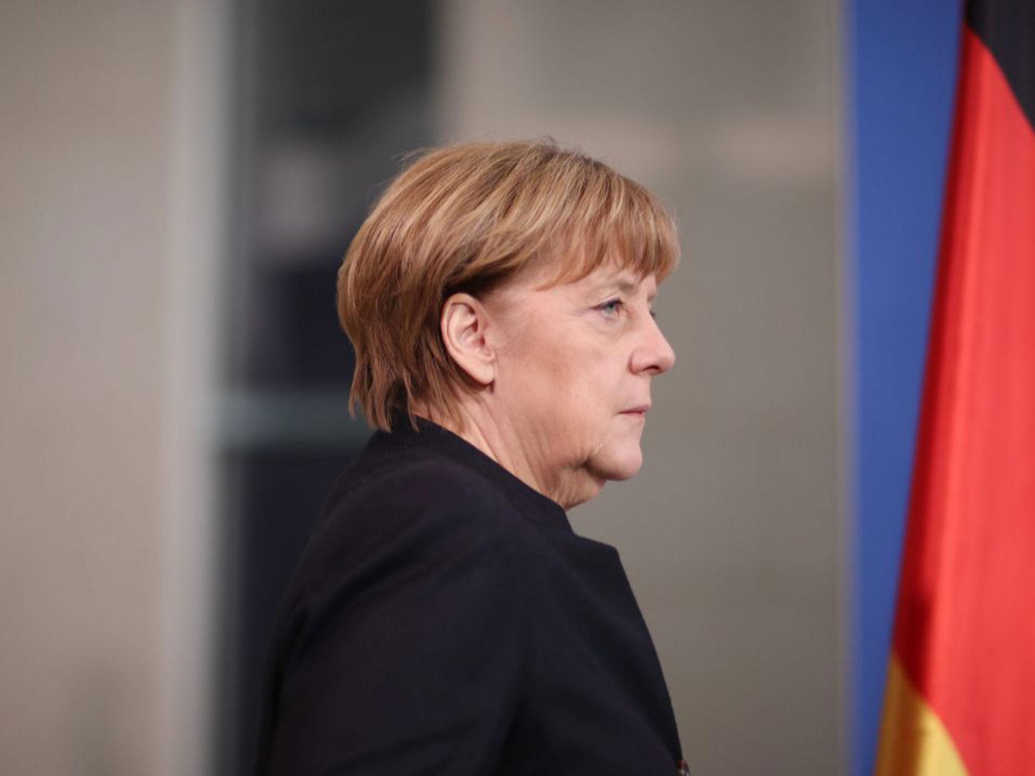 Germany's Angela Merkel attacks Donald Trump for targeting 'people