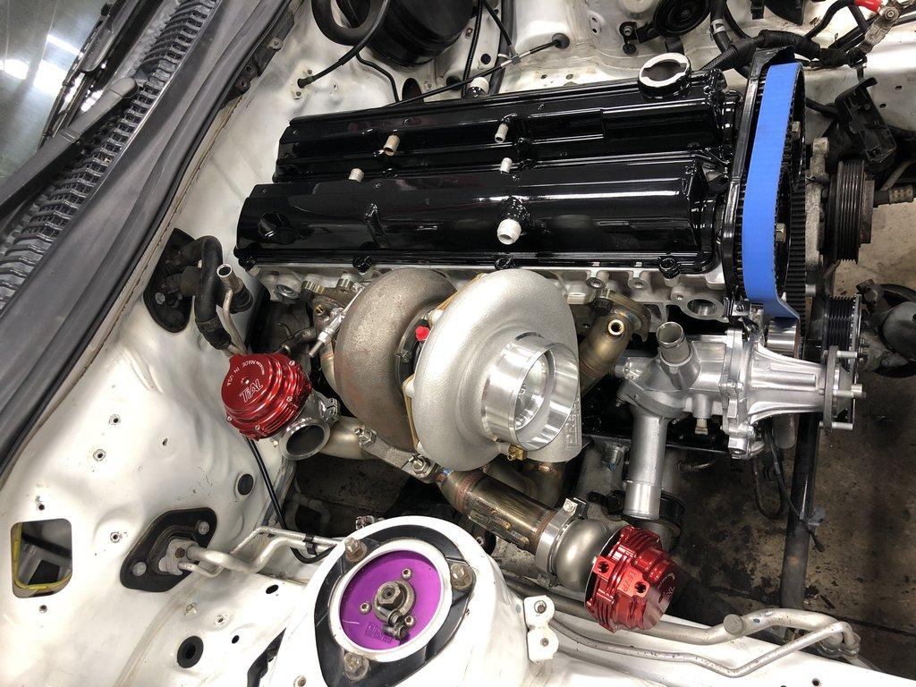 Modified 2JZ GTE Valve Covers For Use With Catch Can With AN