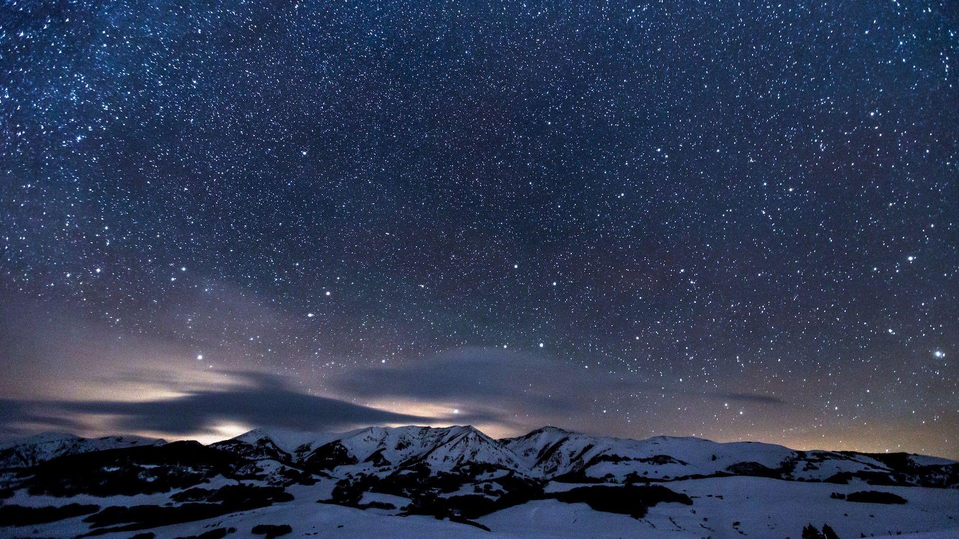 Star Sprinkled Snowy Mountains Wallpaper
