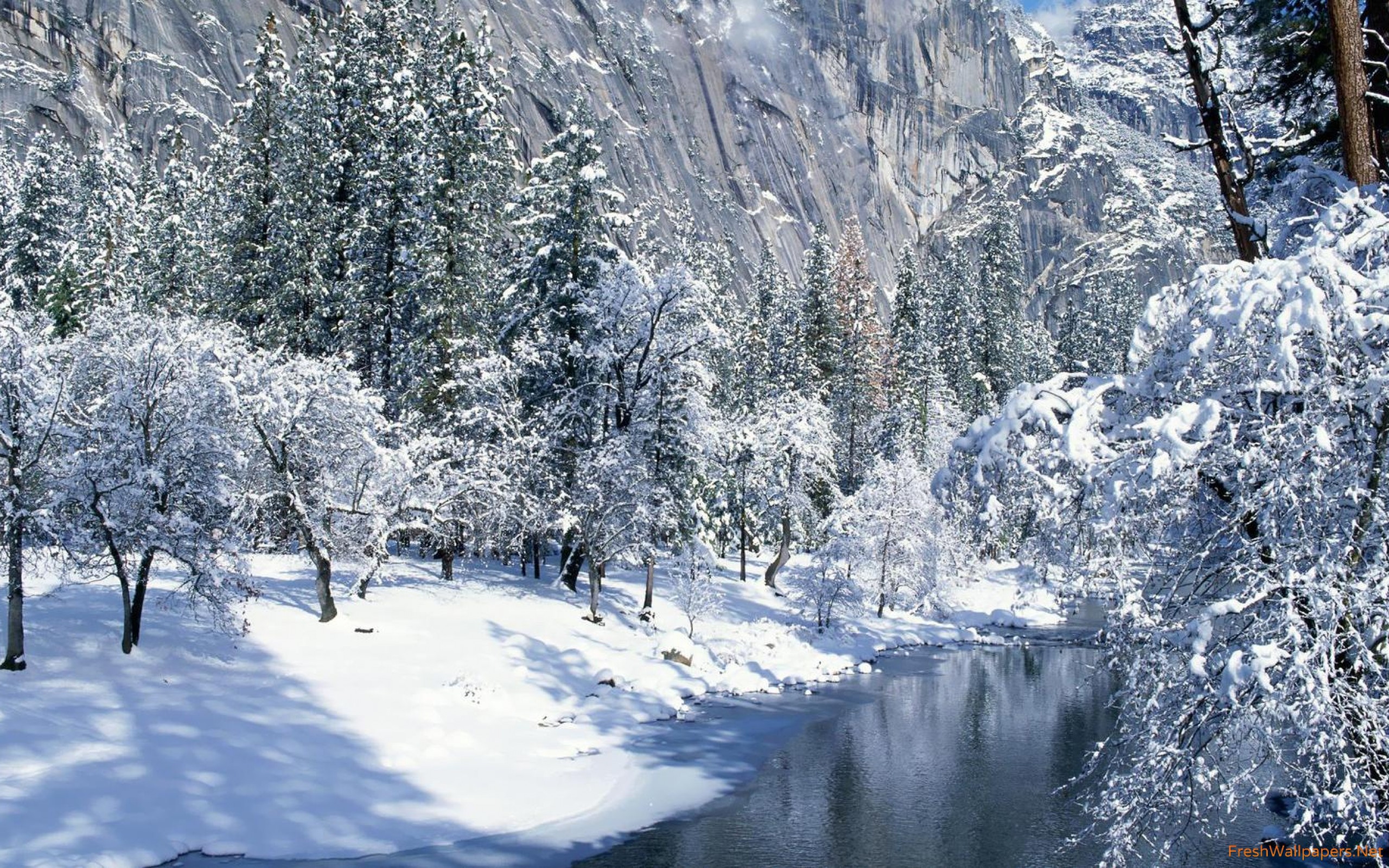 Creek in the snowy mountains wallpaper