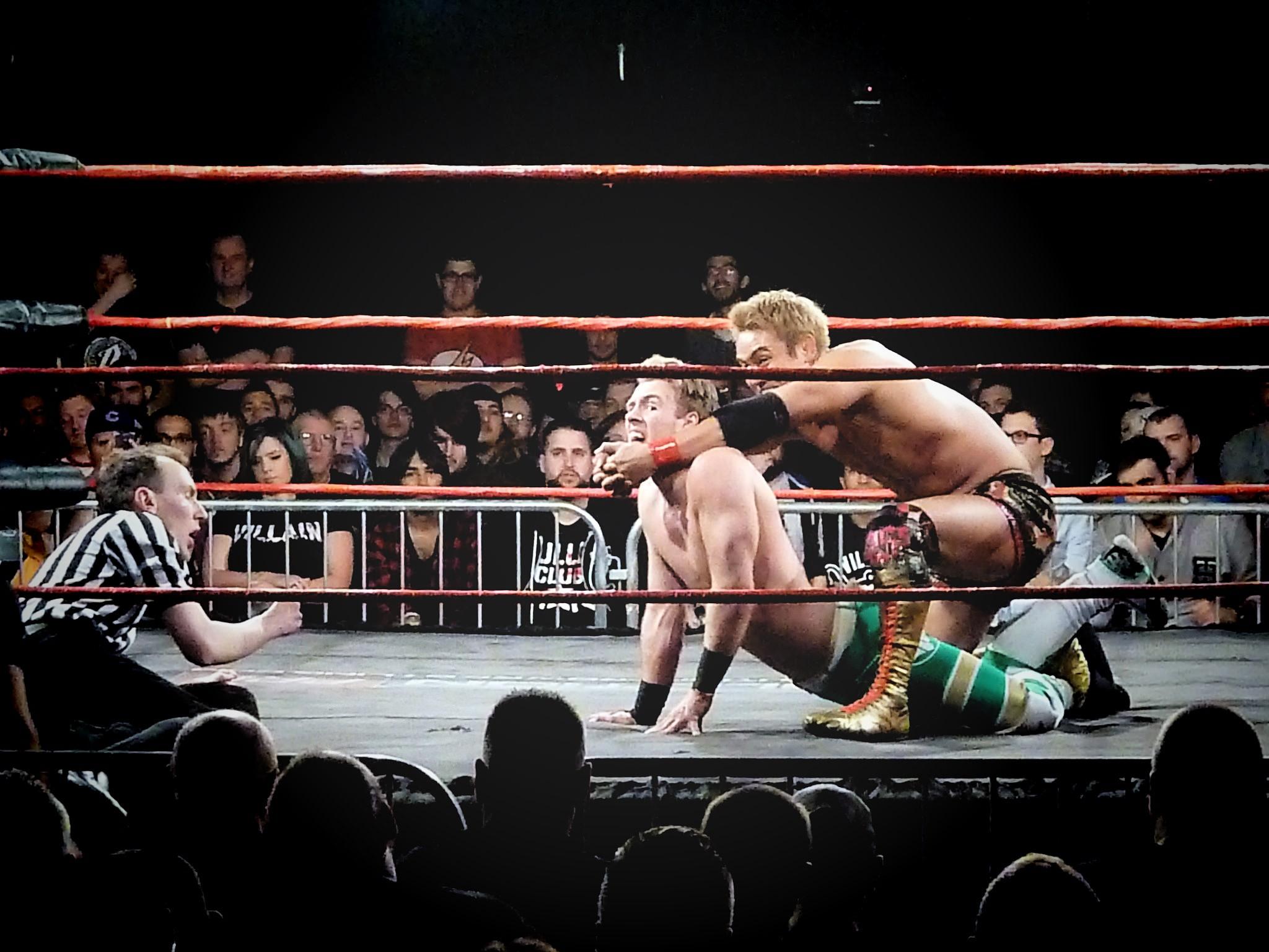 Kazuchika Okada vs. Will Ospreay. Processed using CameraBag