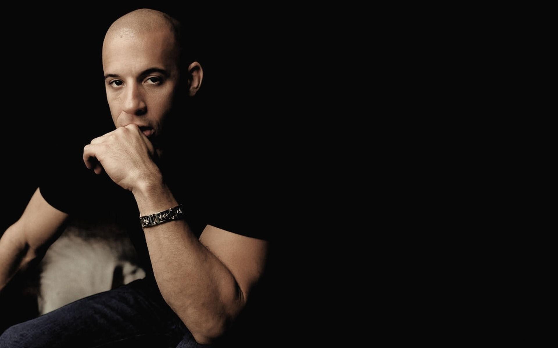 vin diesel, sitting, man, actor, dark background, vin diesel