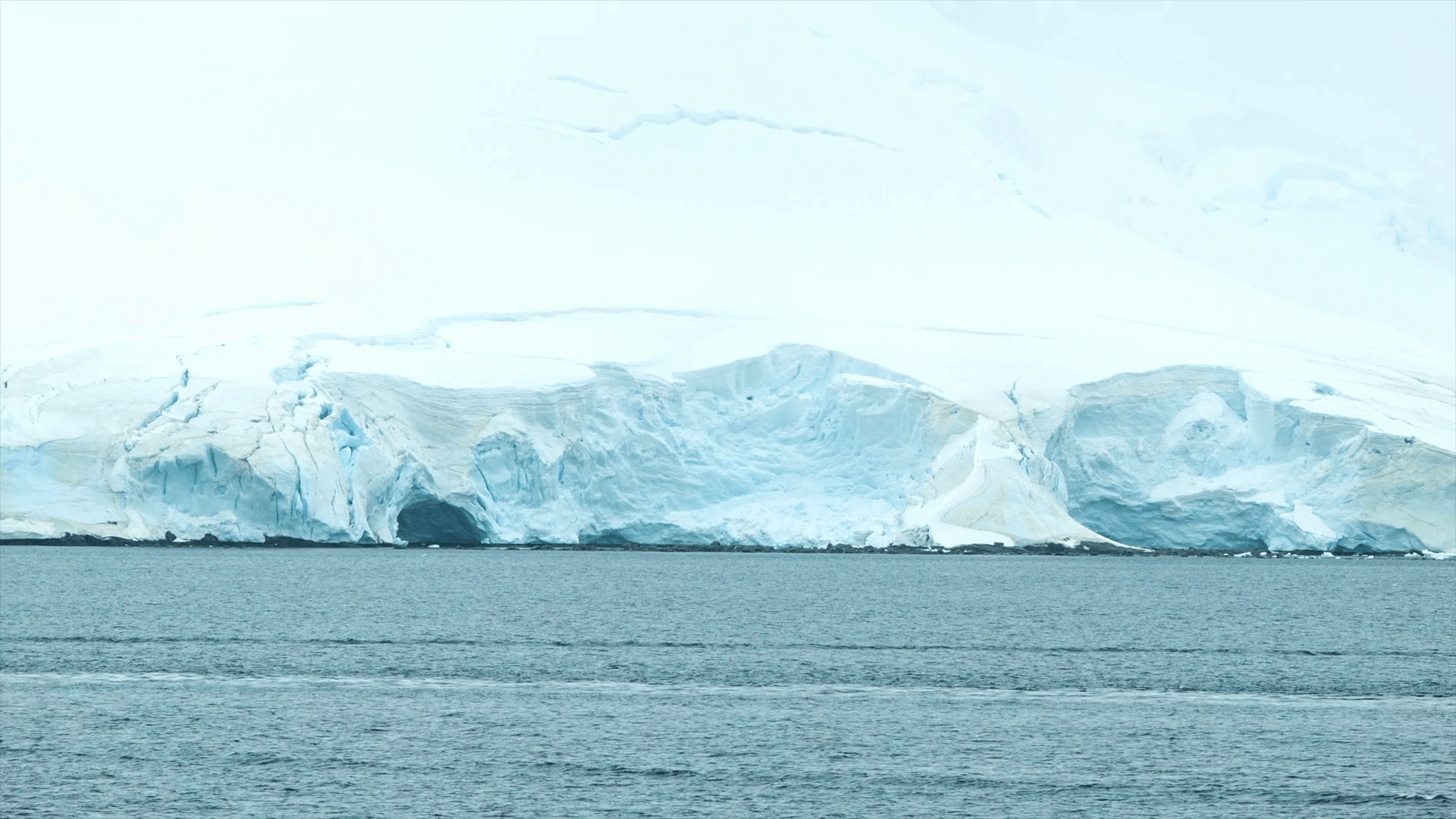 Ice Glaciers in Paradise Bay Antarctica Seen from a Moving Ship