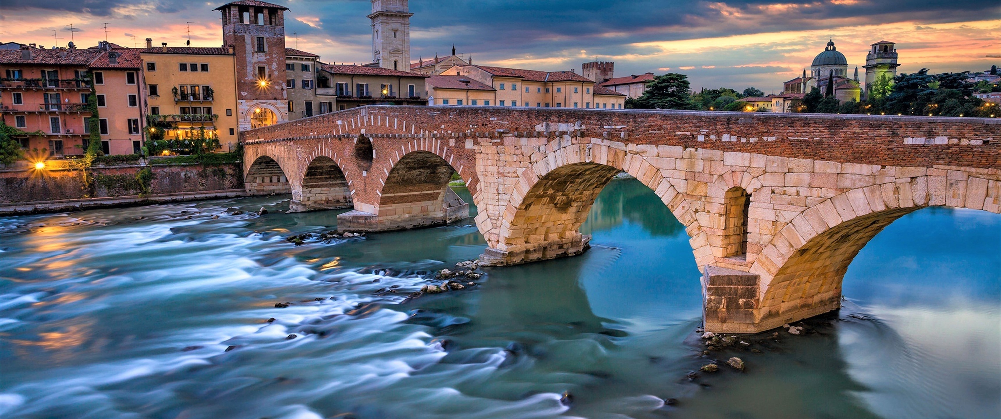 Download 3440x1440 Italy, Verona, Bridge, Dark Clouds, Buildings